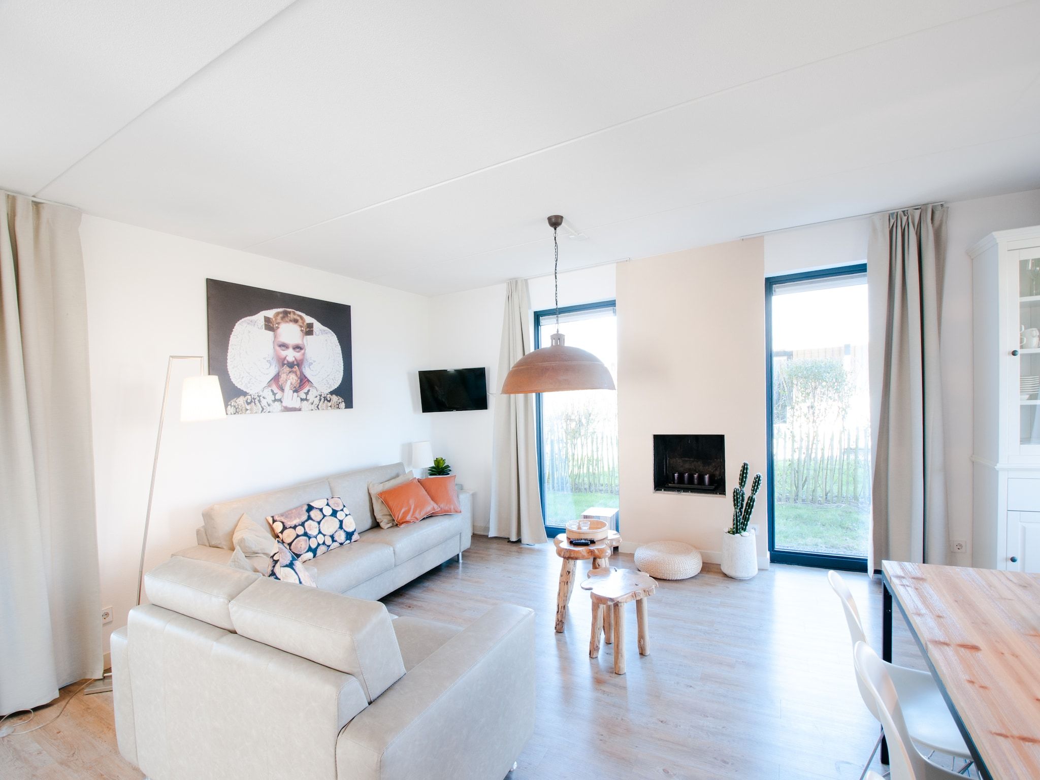 De woonkamer van Resort Waterrijk Oesterdam 6 in Tholen