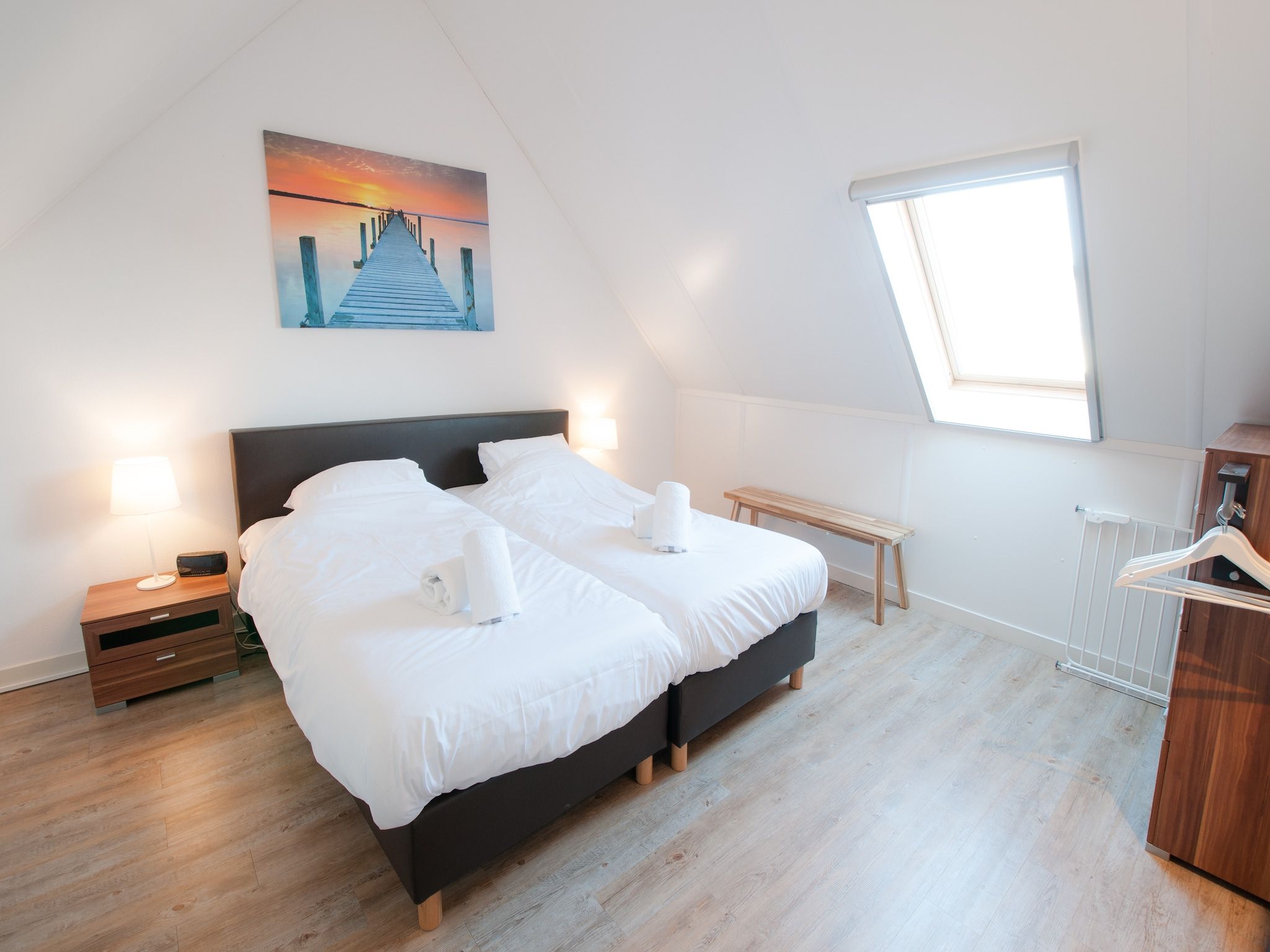 Een slaapkamer van Resort Waterrijk Oesterdam 6 in Tholen