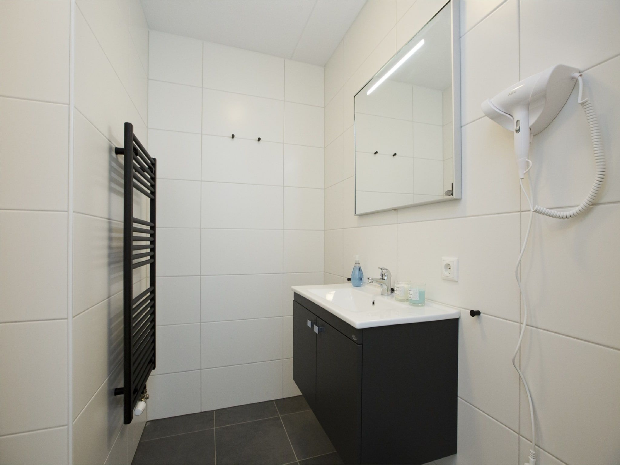 De badkamer van Landgoed De IJsvogel 8 in Voorthuizen