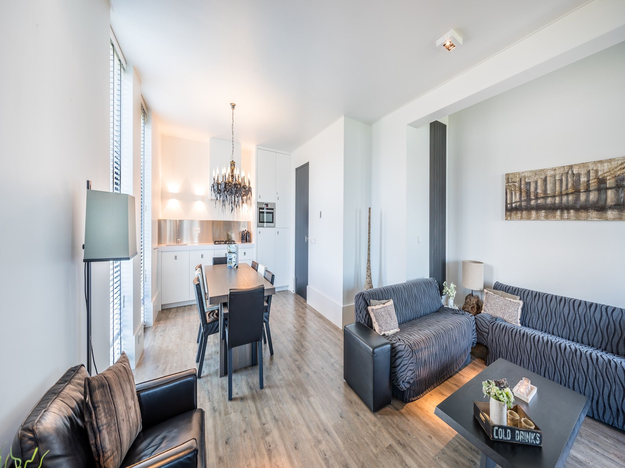 De woonkamer van Resort Waterrijk Oesterdam 9 in Tholen