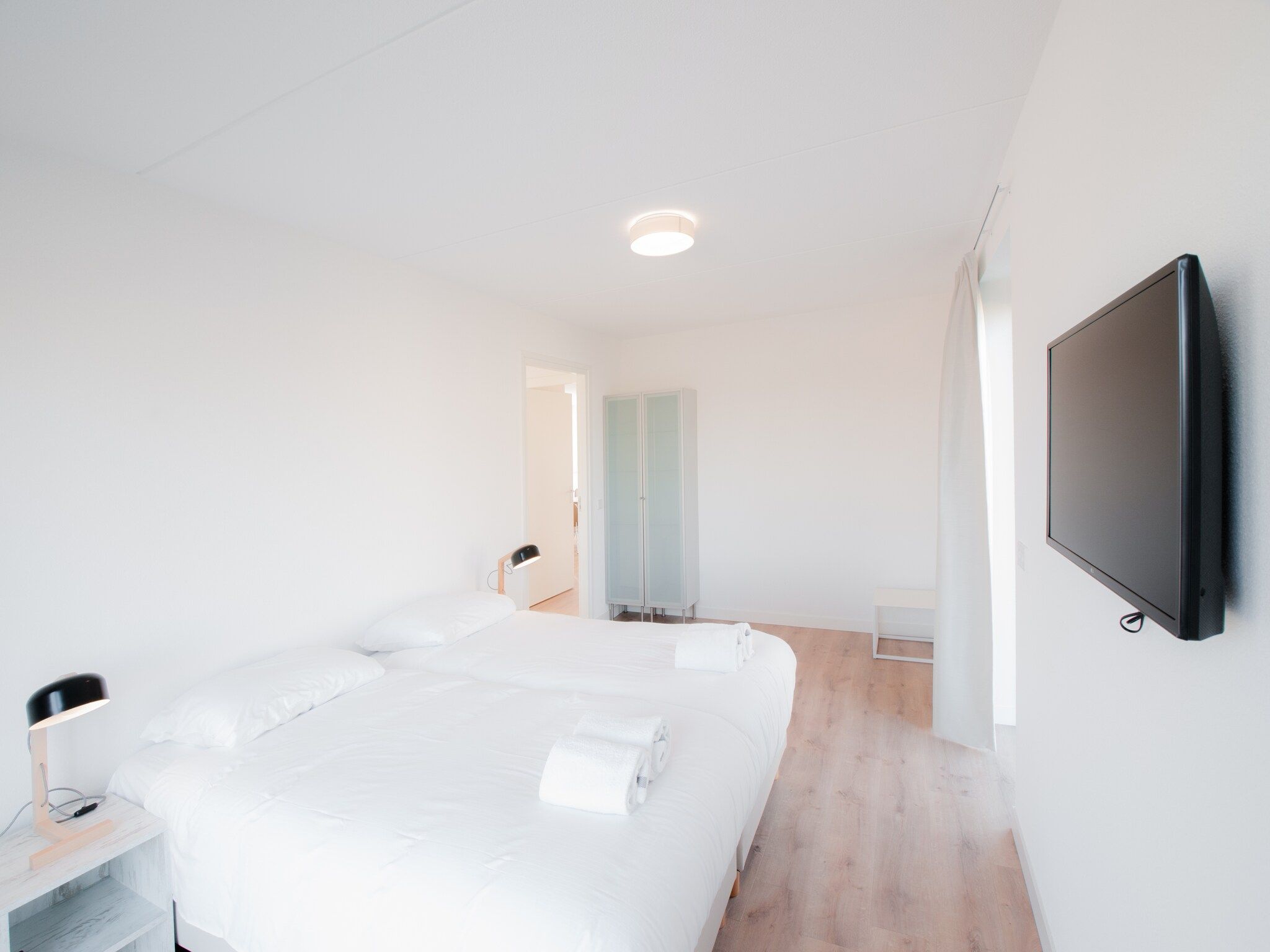 Een slaapkamer van Resort Waterrijk Oesterdam 14 in Tholen