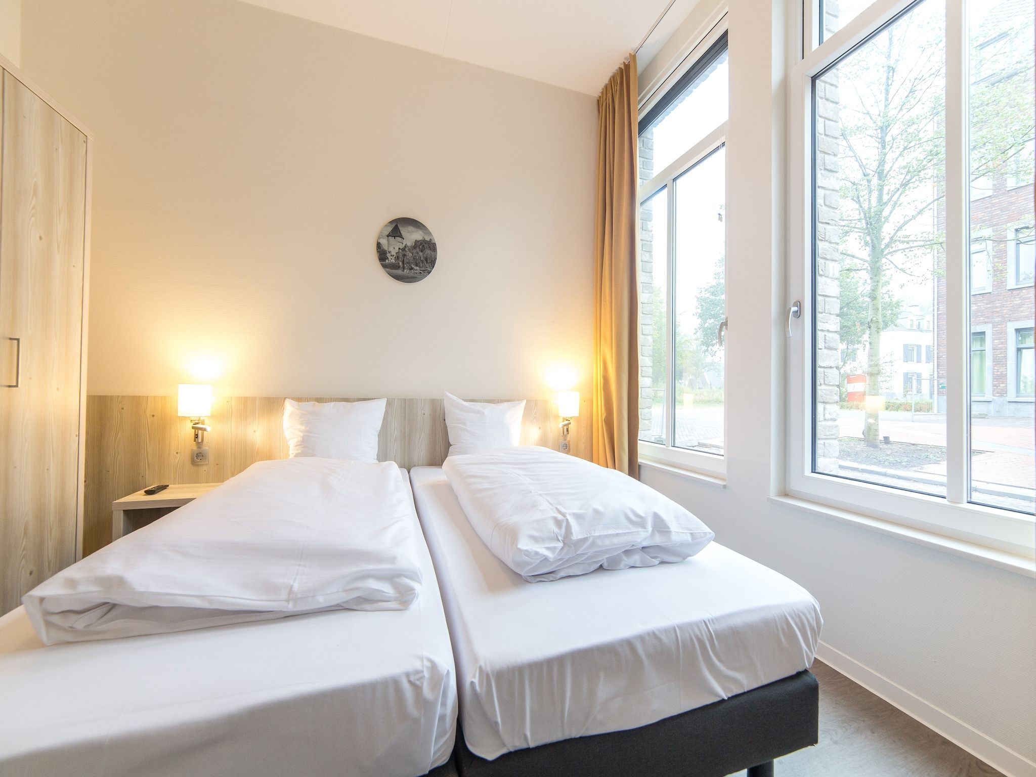Een slaapkamer van Resort Maastricht 21 in Maastricht