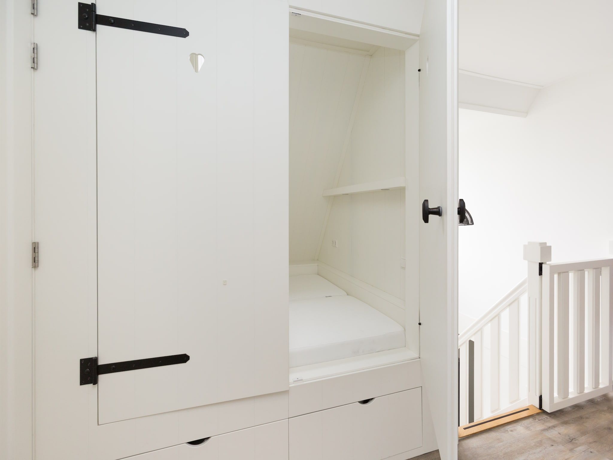 Een slaapkamer van Friese Meren Villa's 10 in Delfstrahuizen