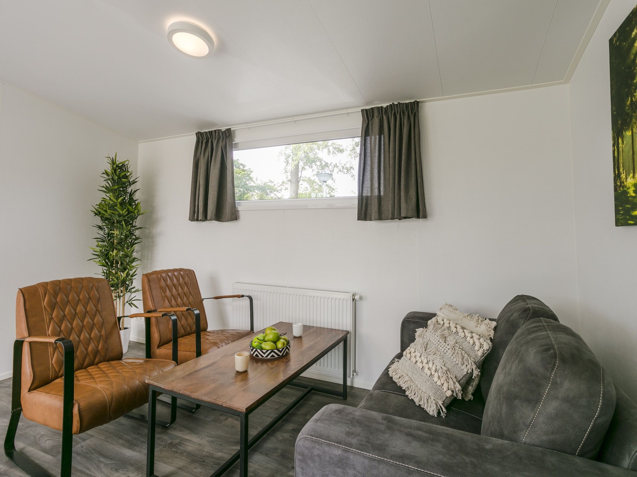 De woonkamer van Vakantiepark De Lochemse Berg 2 in Lochem