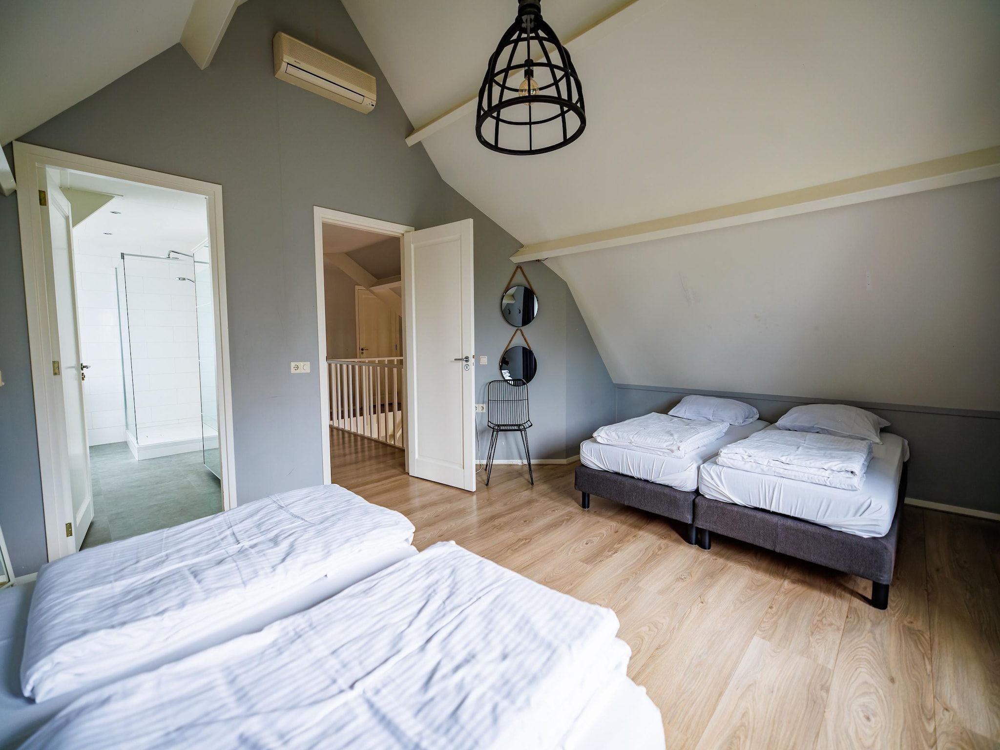 Een slaapkamer van Vakantiepark Eiland van Maurik 4 in Maurik