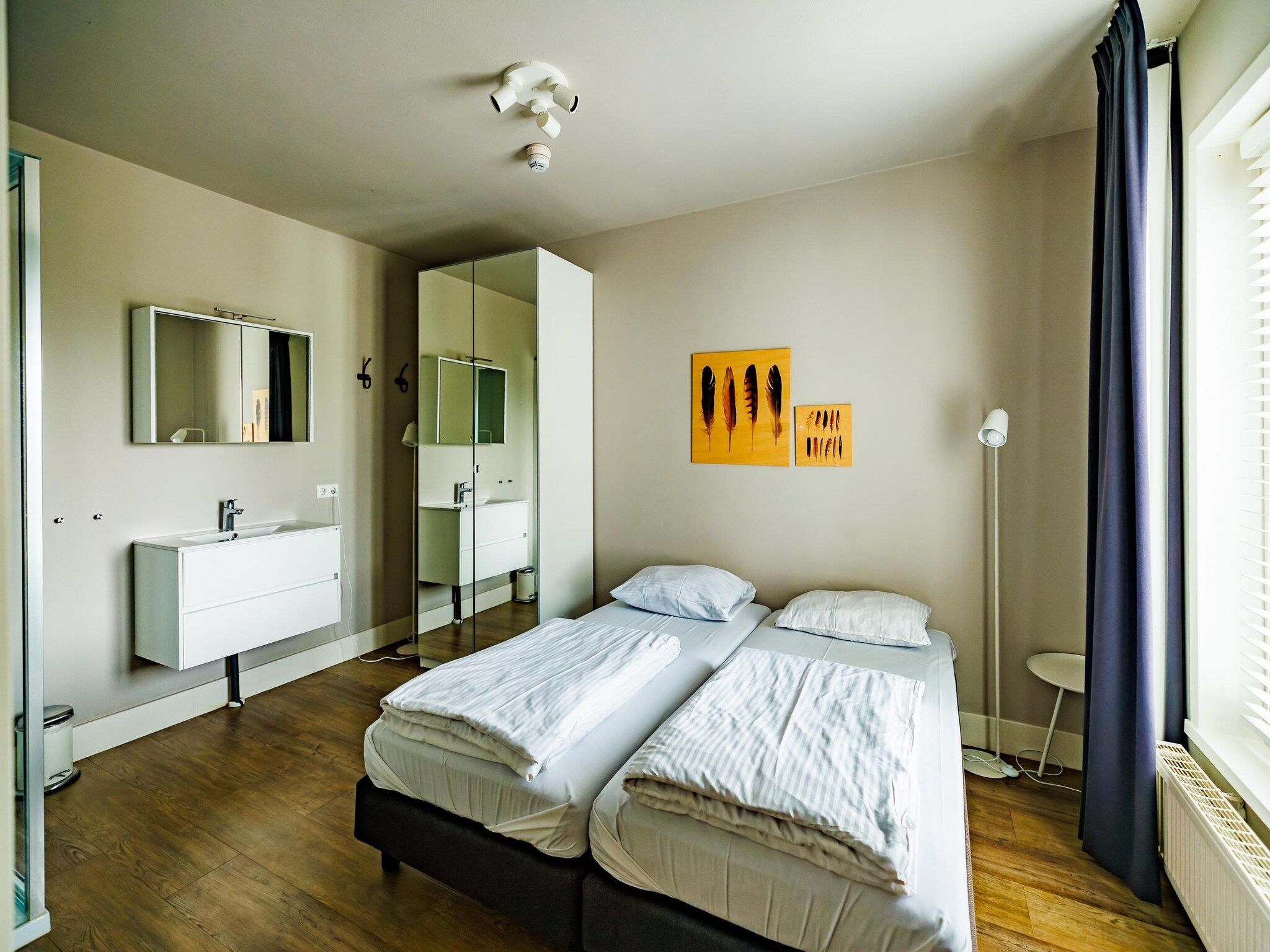 Een slaapkamer van Vakantiepark Eiland van Maurik 4 in Maurik