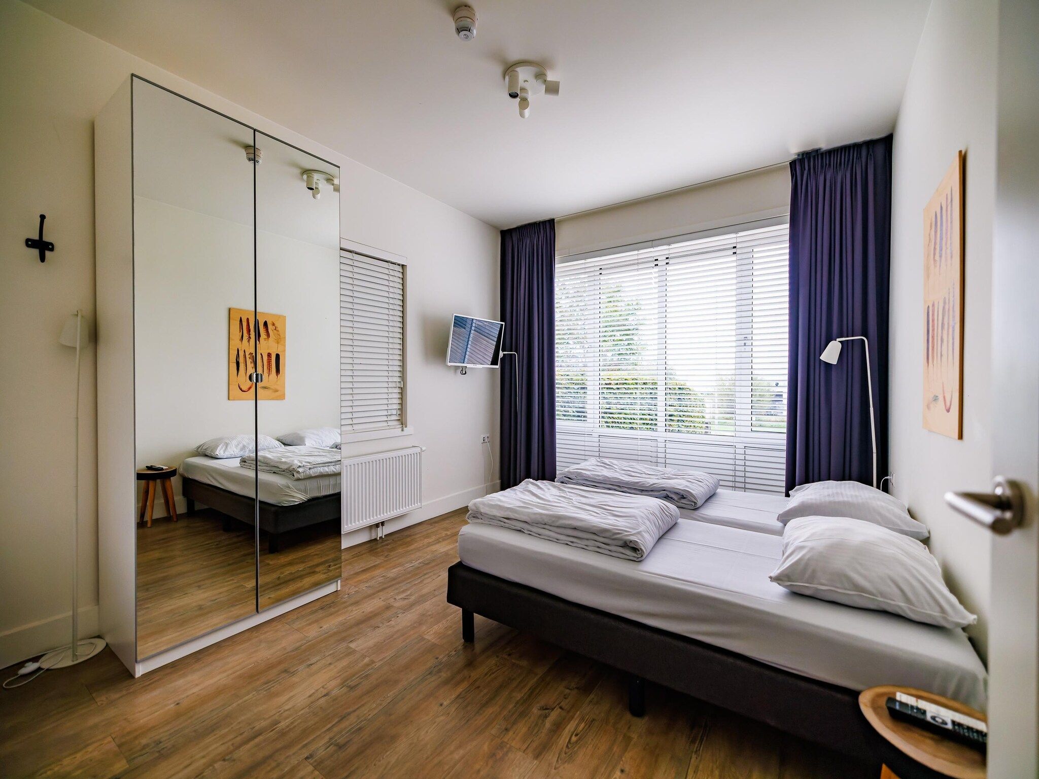 Een slaapkamer van Vakantiepark Eiland van Maurik 4 in Maurik