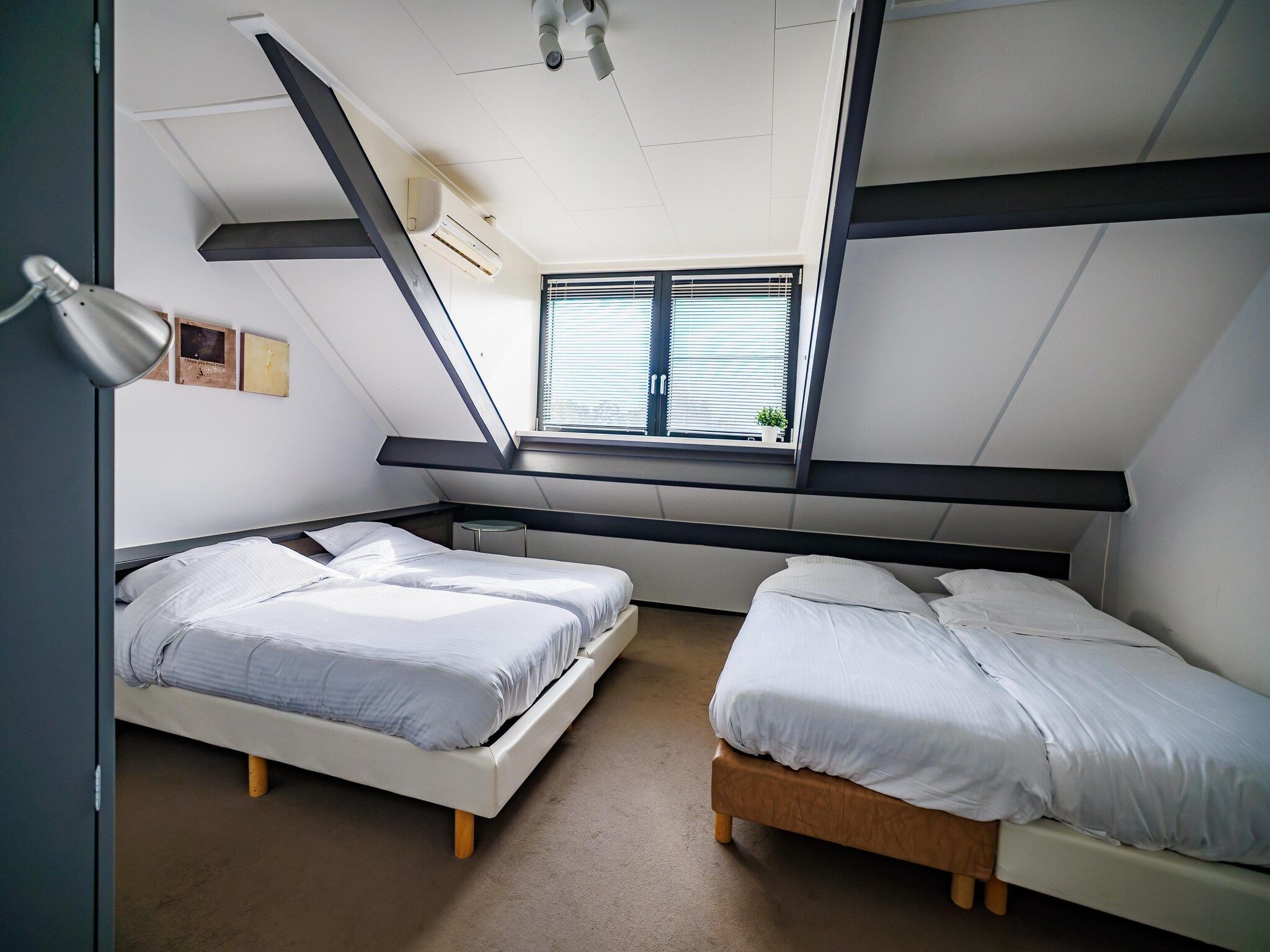 Een slaapkamer van Vakantiepark Eiland van Maurik 5 in Maurik
