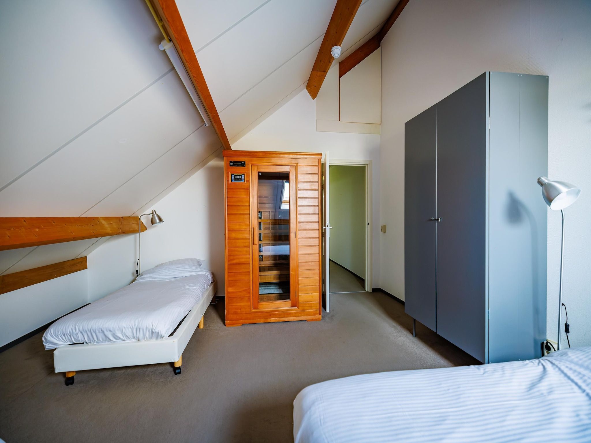 Een slaapkamer van Vakantiepark Eiland van Maurik 5 in Maurik