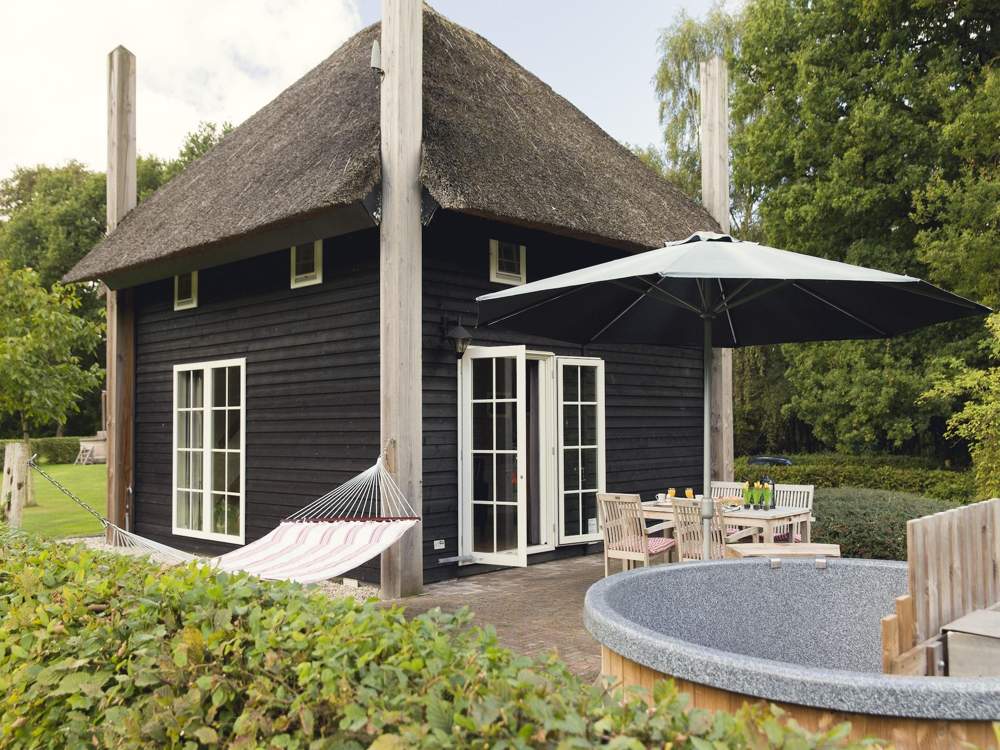 De buitenkant van De Grimberghoeve 1 in Notter