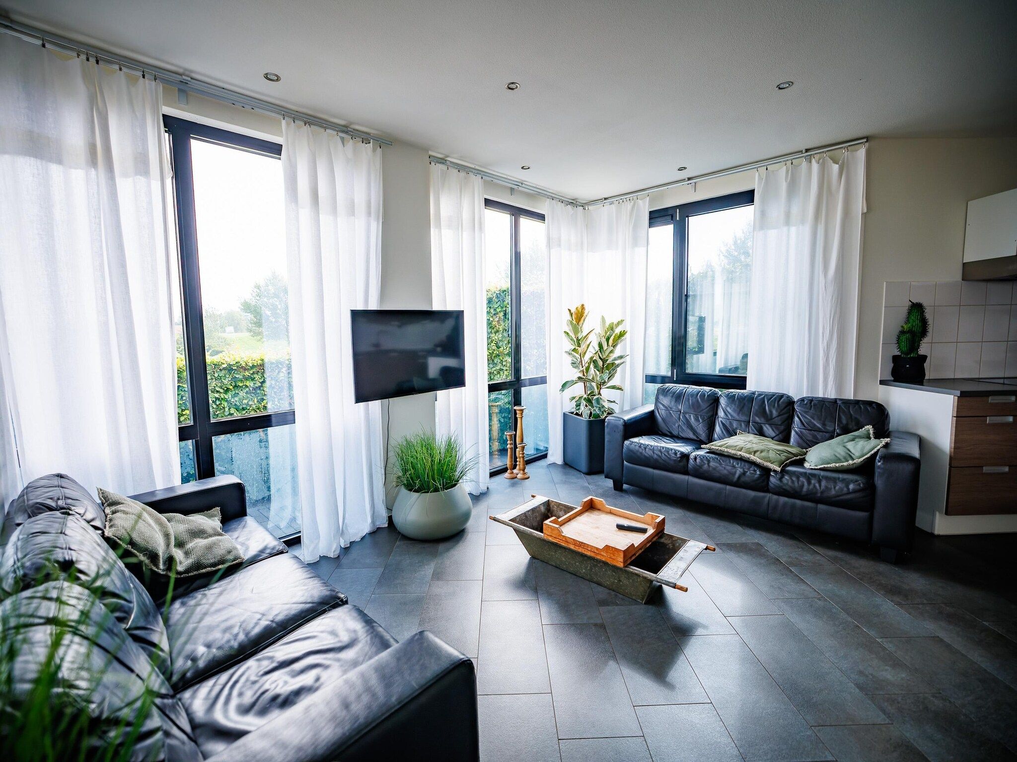 De woonkamer van Vakantiepark Eiland van Maurik 6 in Maurik