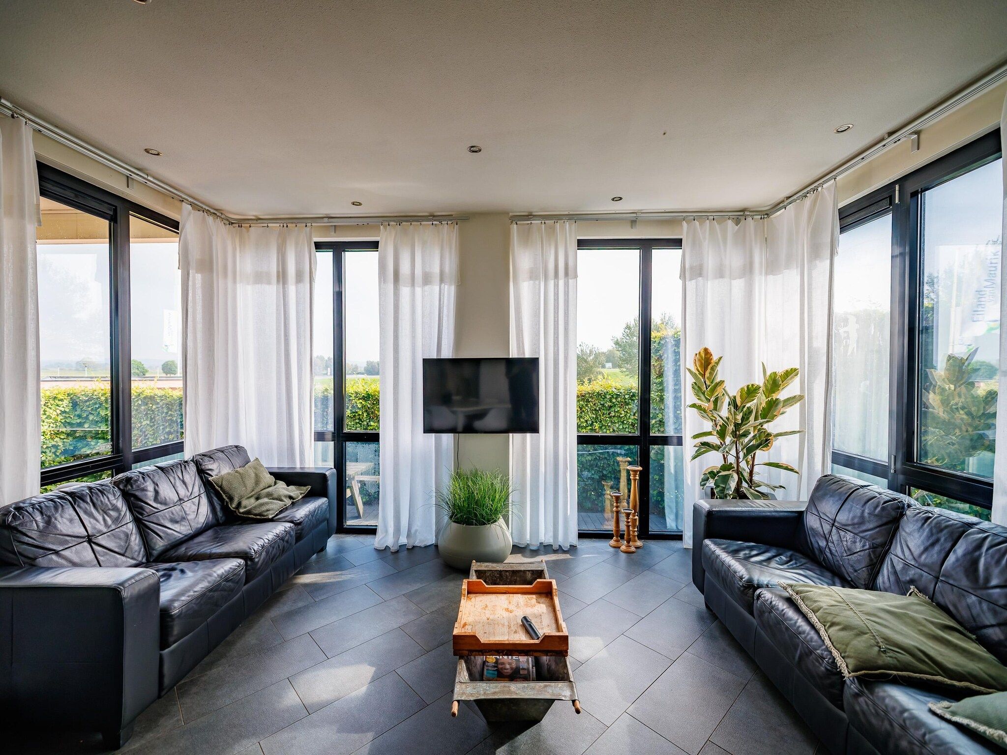 De woonkamer van Vakantiepark Eiland van Maurik 6 in Maurik