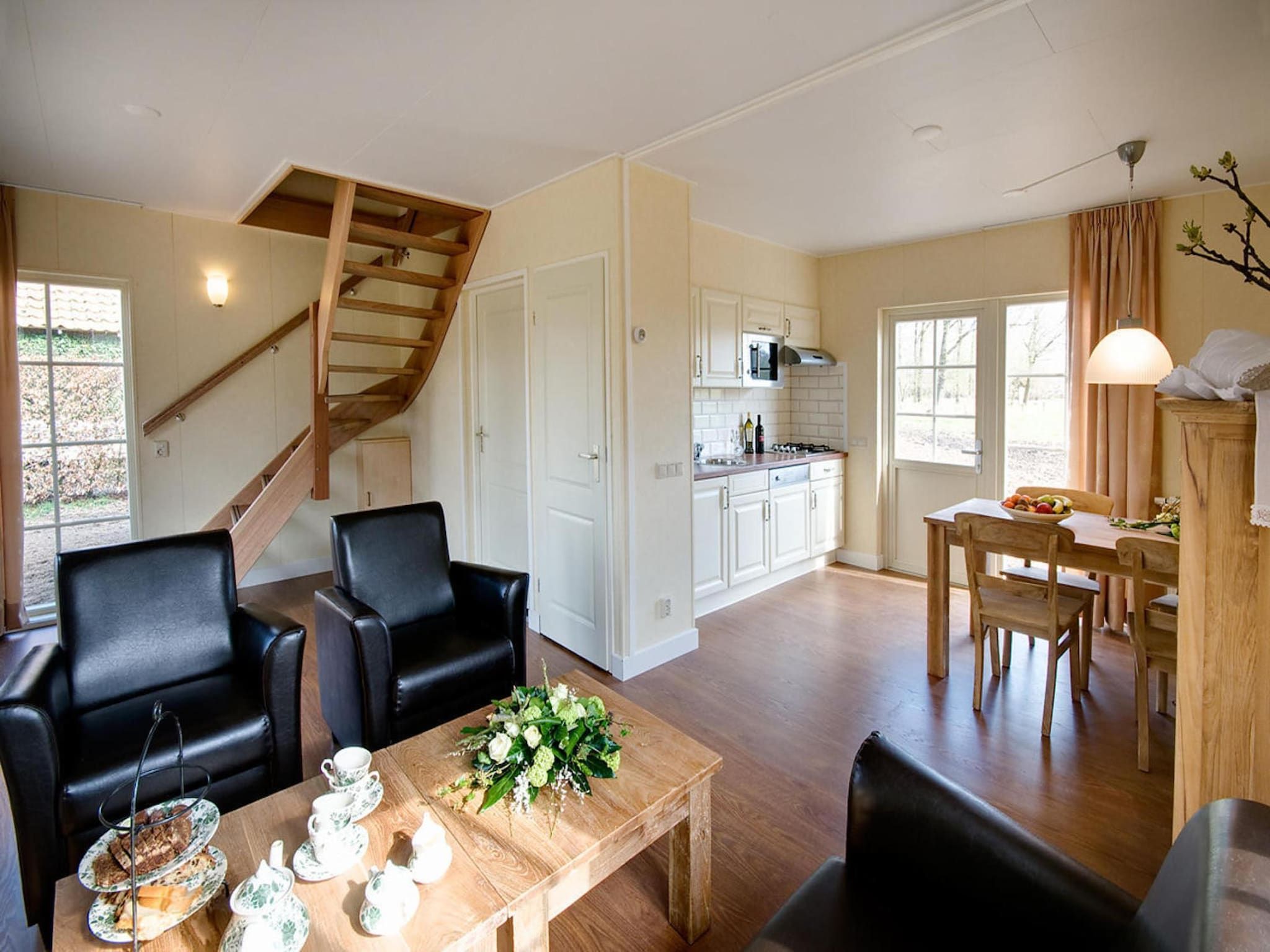 De woonkamer van De Grimberghoeve 2 in Notter