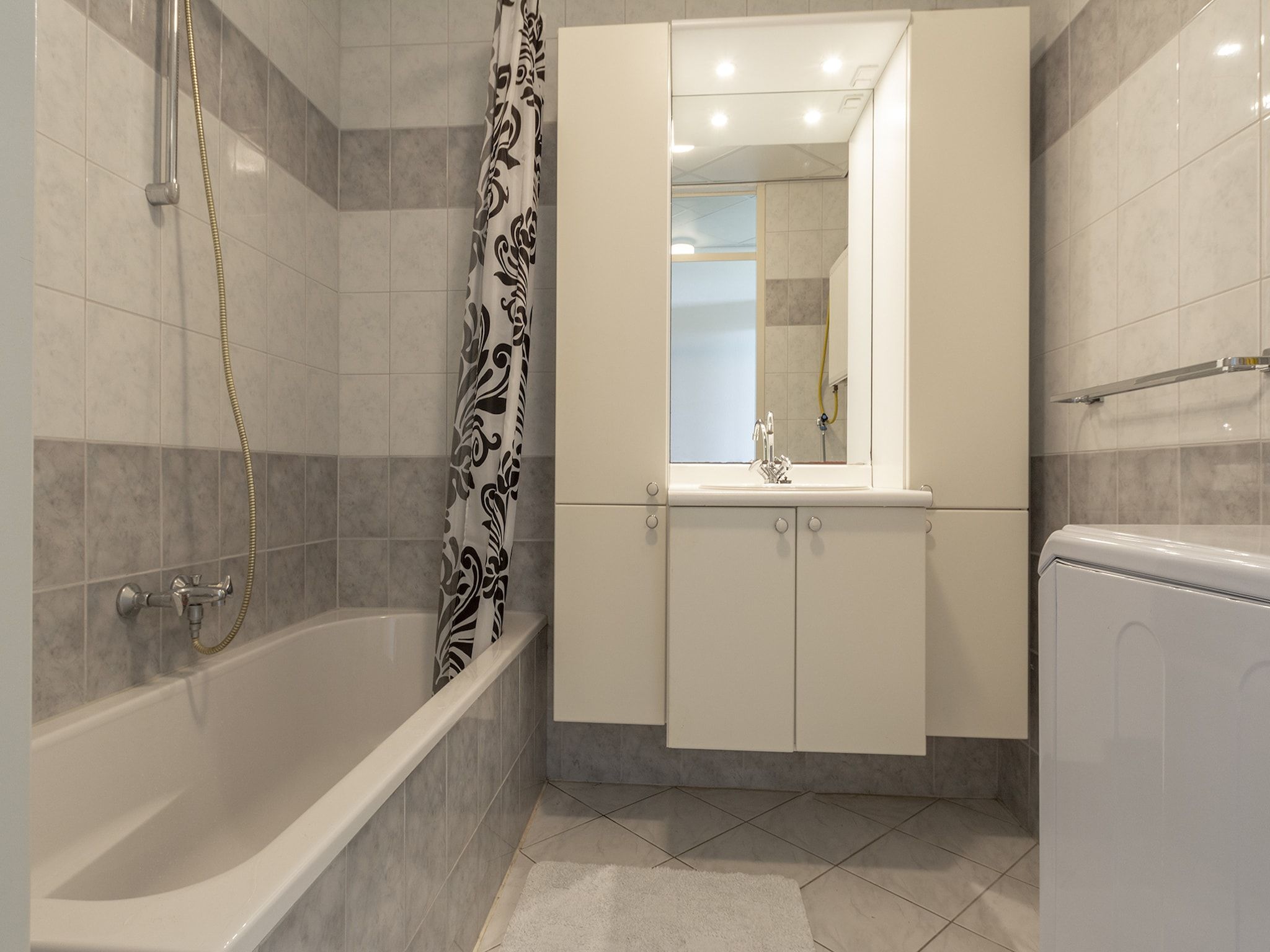 De badkamer van Strandslag 115 in Julianadorp aan Zee