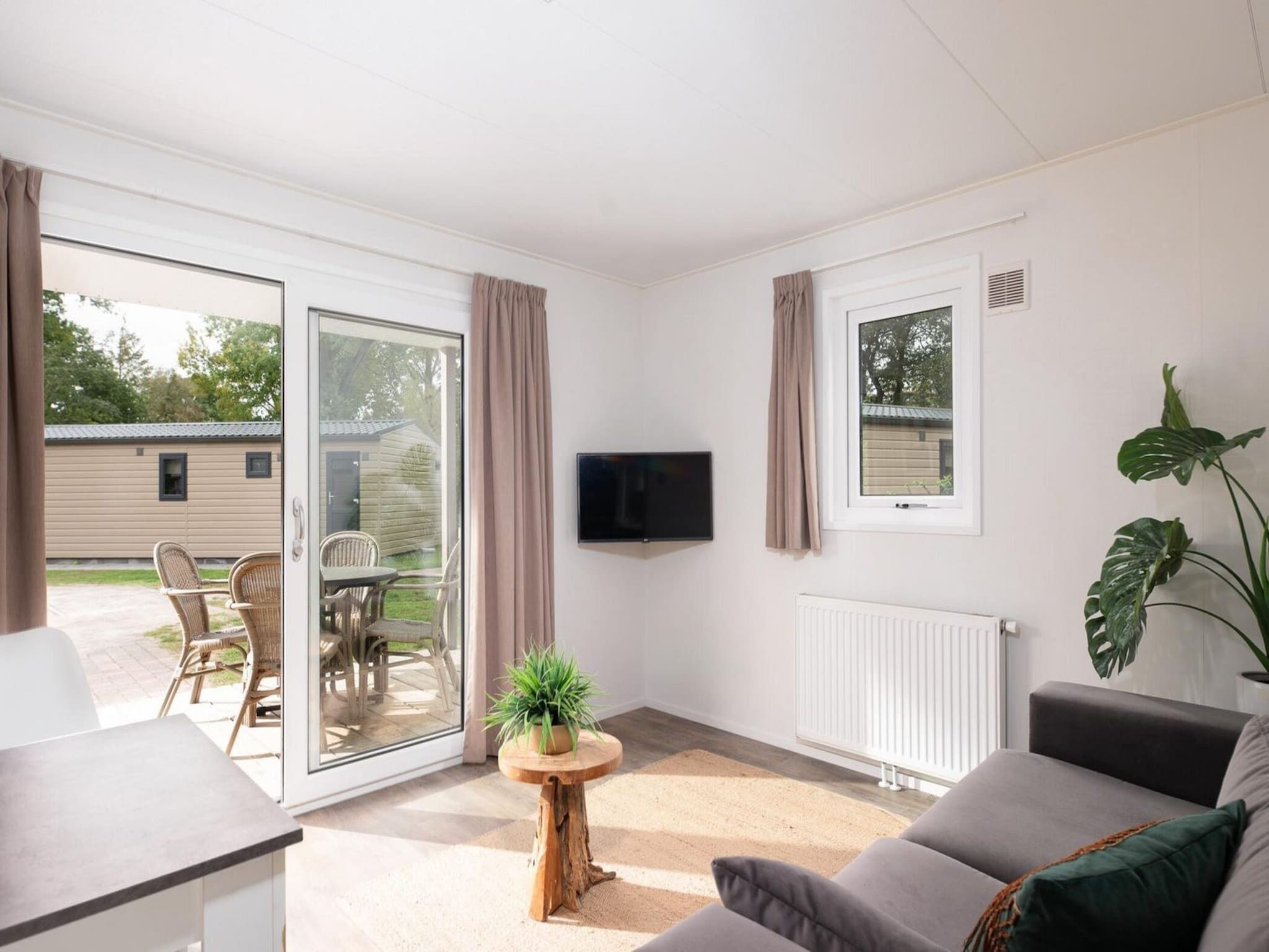De woonkamer van Vakantiepark Mölke 23 in Zuna