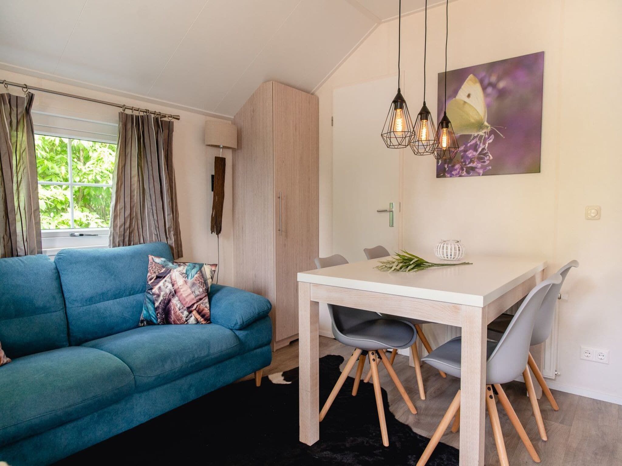 De woonkamer van Vakantiepark Mölke 24 in Zuna