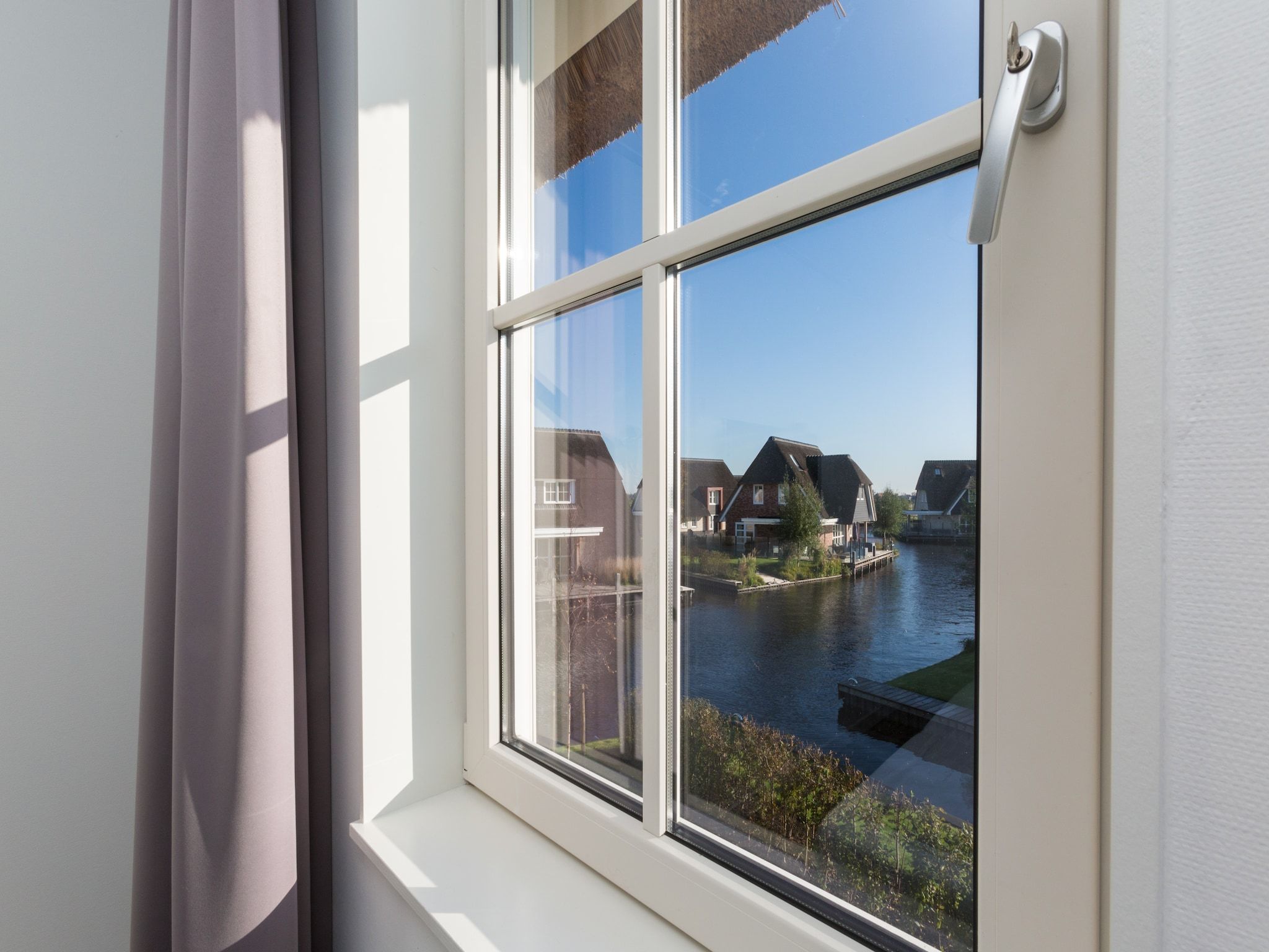 Het uitzicht vanaf Friese Meren Villa's 14 in Delfstrahuizen