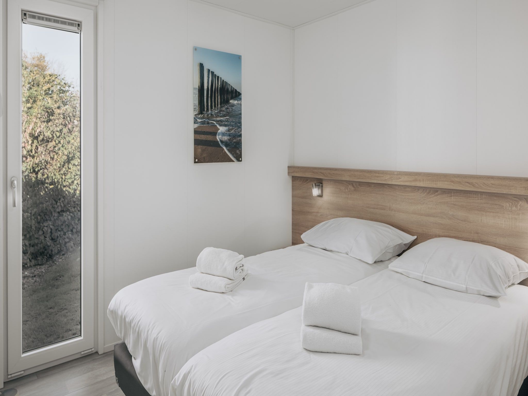 Een slaapkamer van Vakantiepark Hof Domburg 20 in Domburg