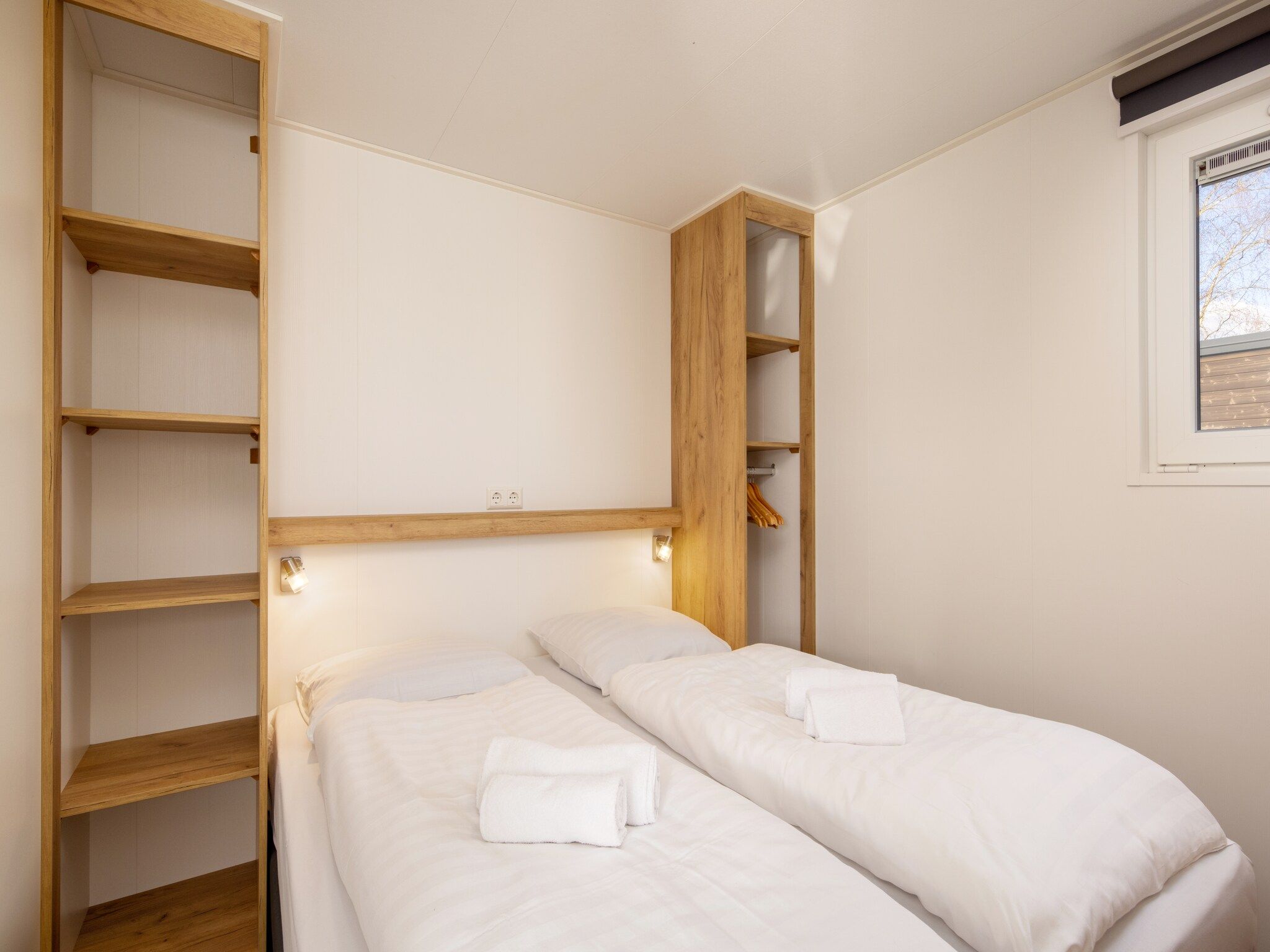 Een slaapkamer van Hunzepark 12 in Gasselternijveen