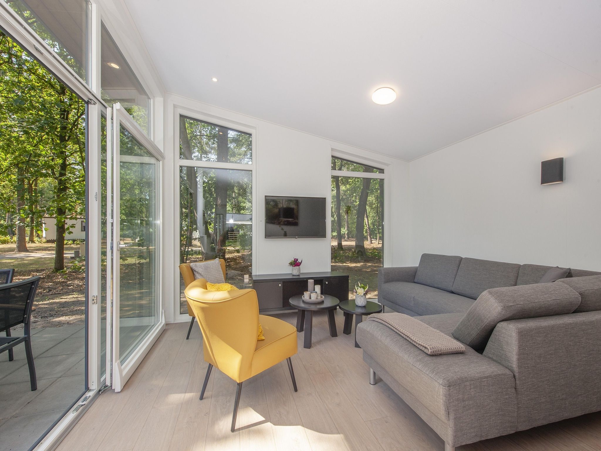 De woonkamer van Bospark 't Wolfsven 11 in Mierlo