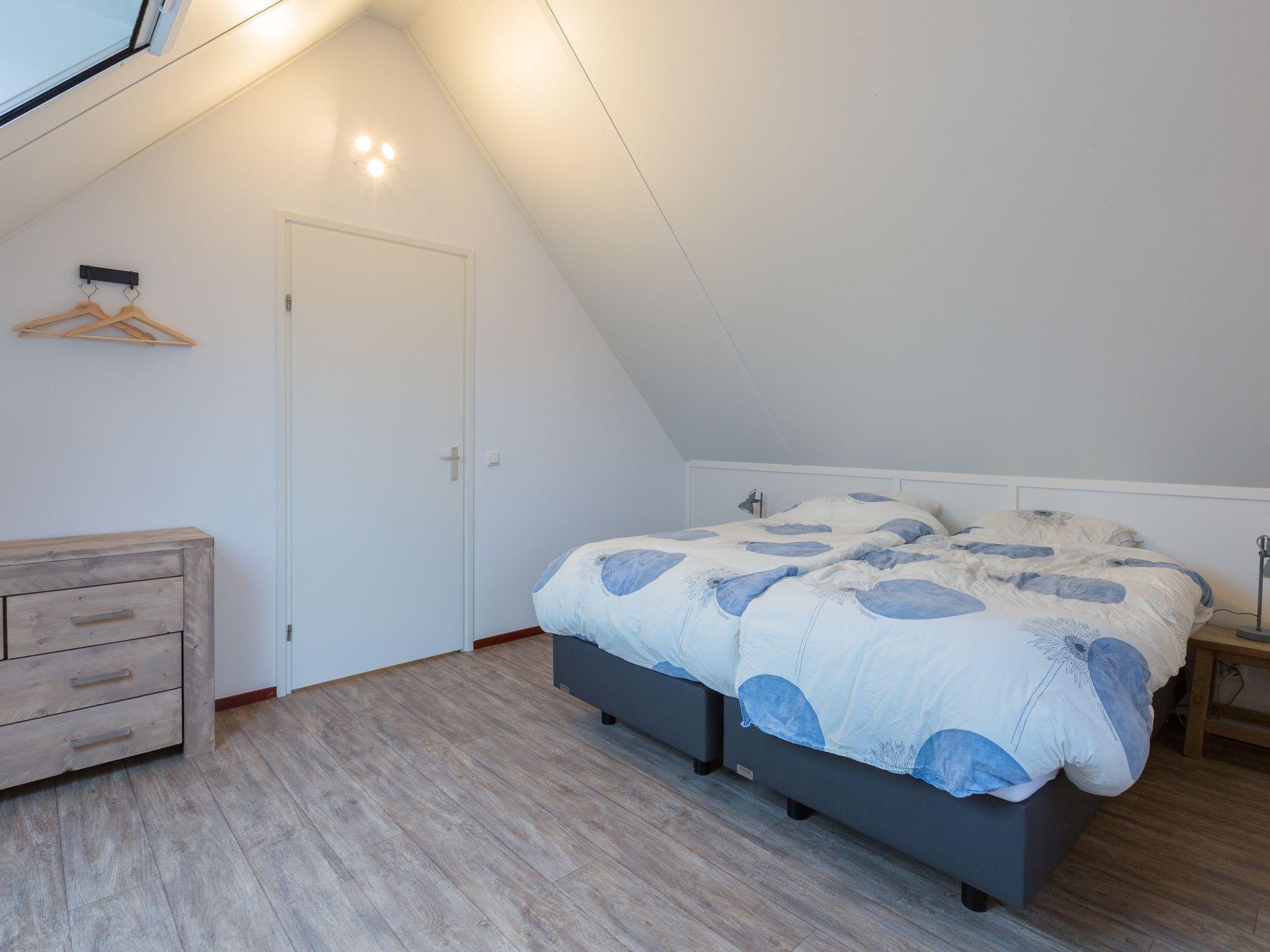 Een slaapkamer van Waterpark Langelille 2 in Langelille