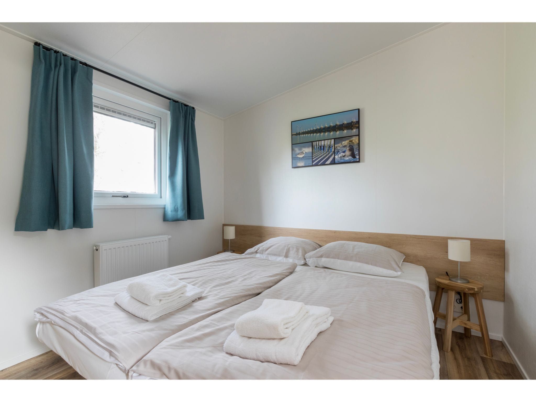 Een slaapkamer van Fort den Haak - Chalet 1 t/m 10 huisdiervrij in Vrouwenpolder