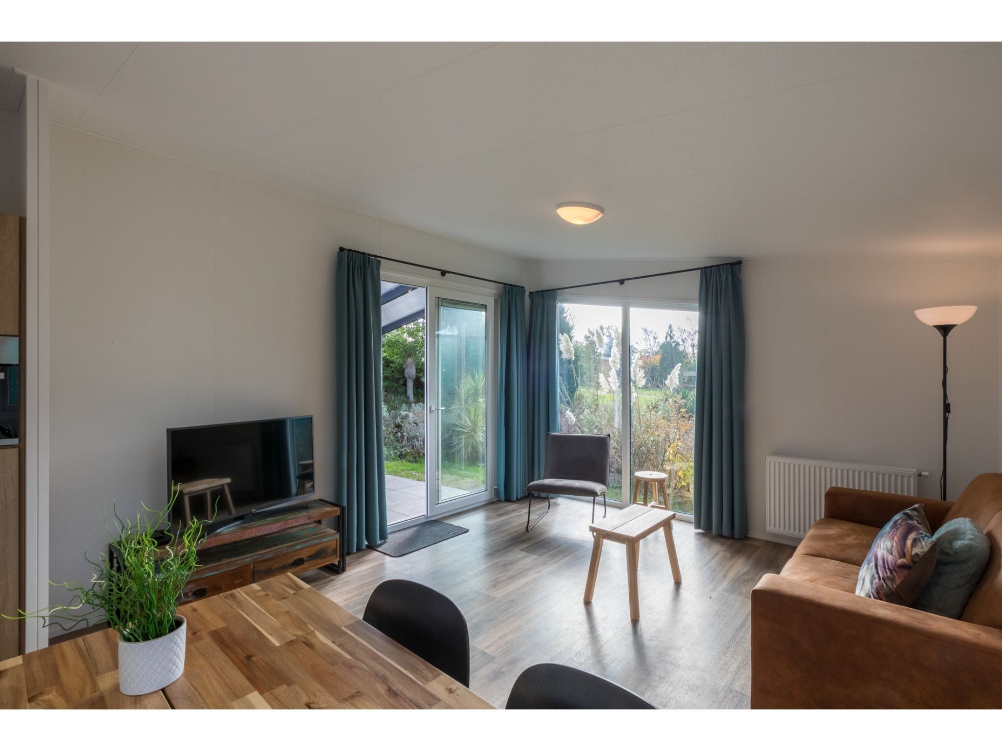 De woonkamer van Fort den Haak - Chalet 1 t/m 10 huisdiervrij in Vrouwenpolder