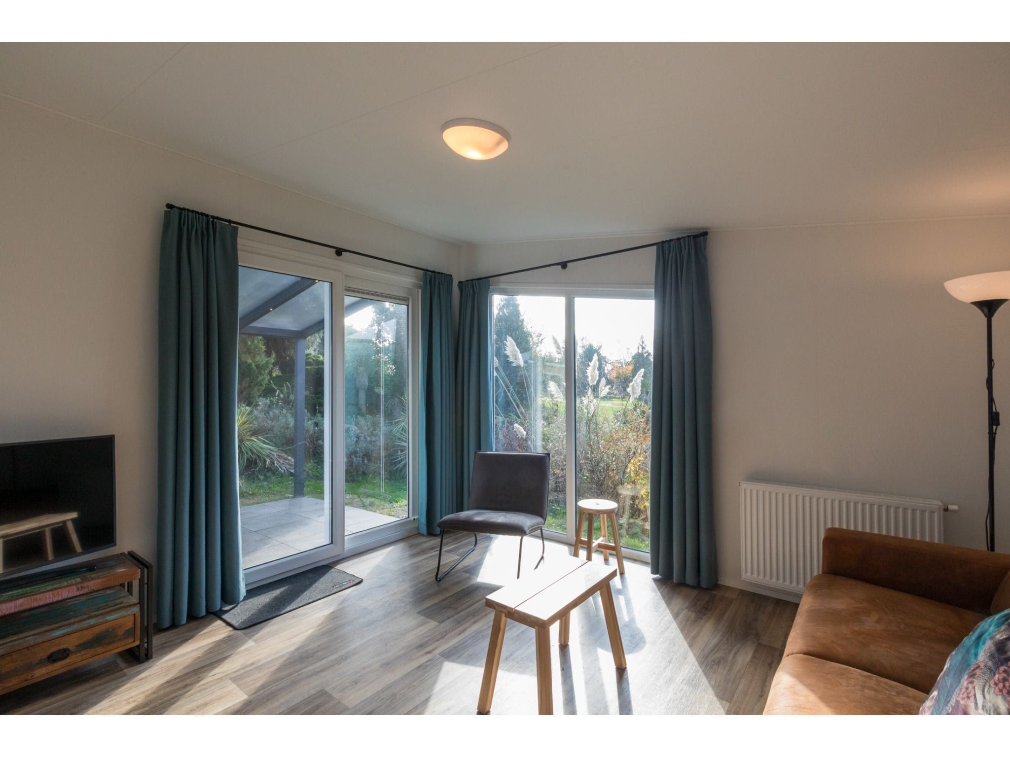 De woonkamer van Fort den Haak - Chalet 1 t/m 10 huisdiervrij in Vrouwenpolder