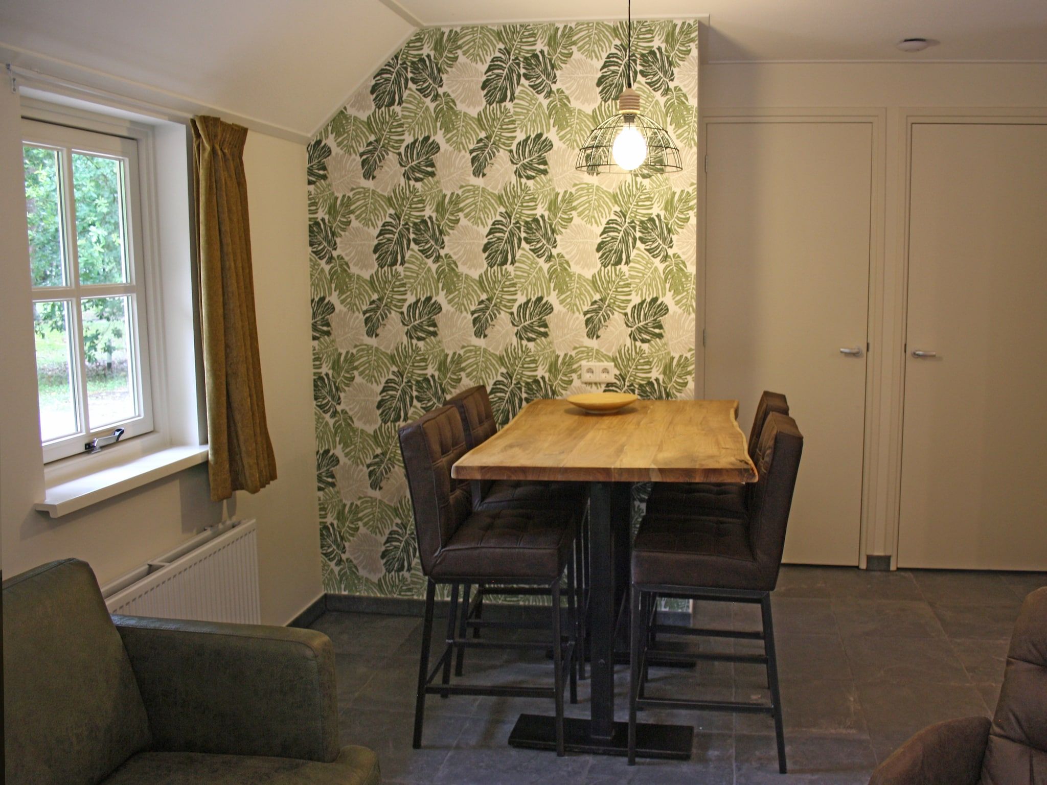 De woonkamer van Vakantiepark Herperduin 16 in Herpen