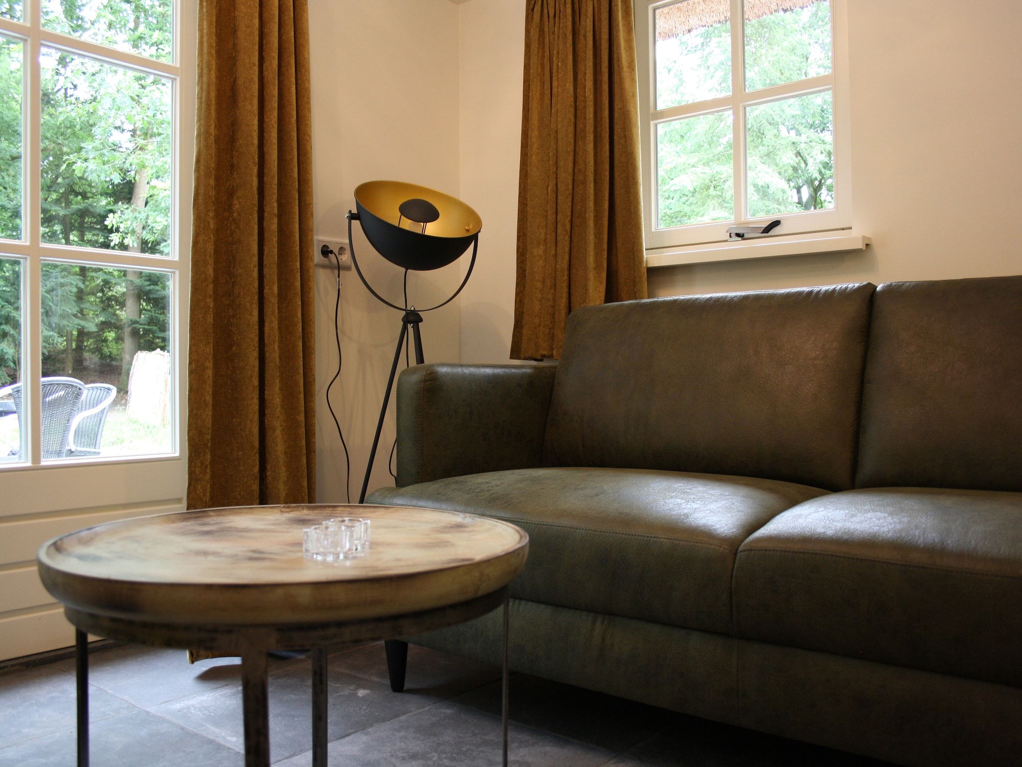 De woonkamer van Vakantiepark Herperduin 16 in Herpen