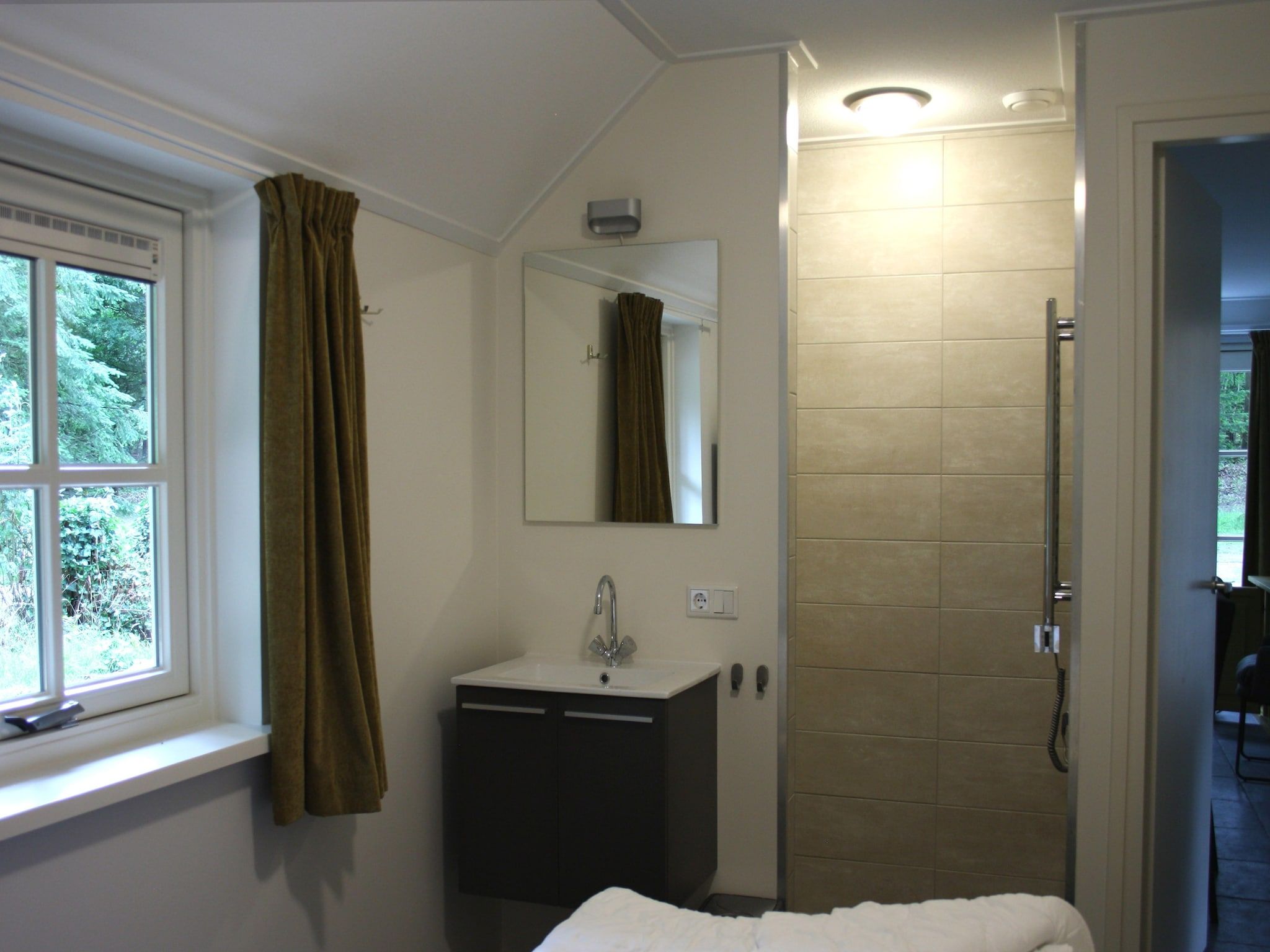 De badkamer van Vakantiepark Herperduin 16 in Herpen