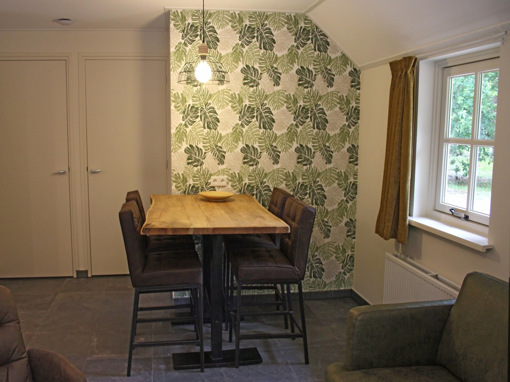 De eetkamer van Vakantiepark Herperduin 16 in Herpen