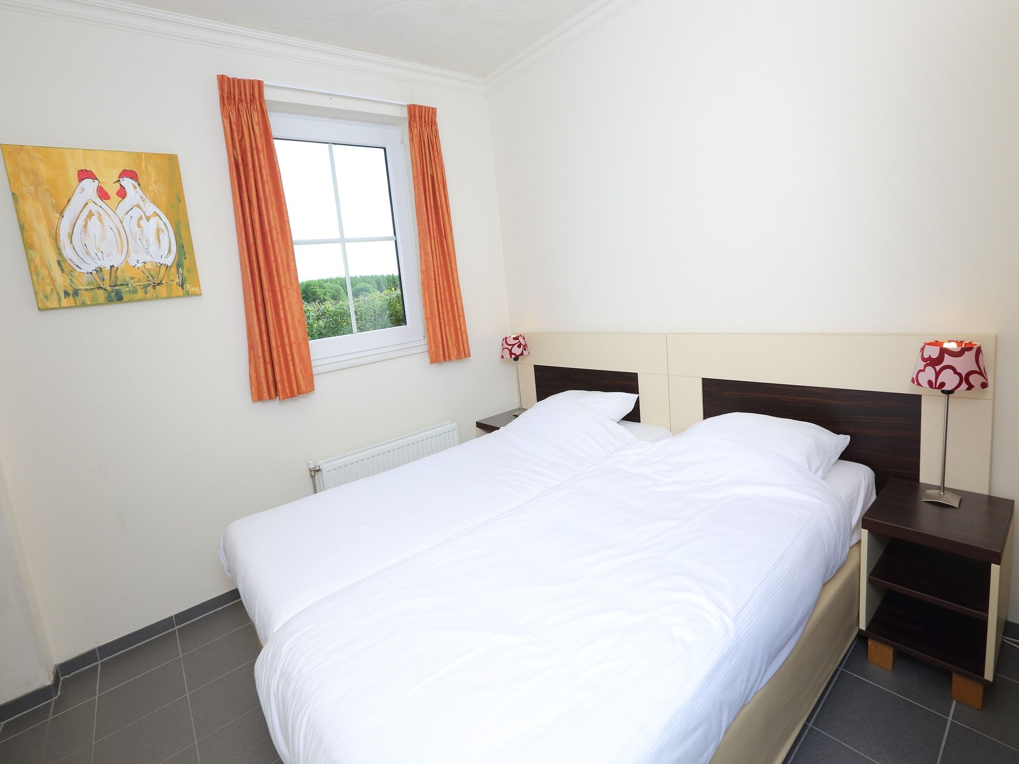 Een slaapkamer van Vakantiepark Emslandermeer 8 in Vlagtwedde