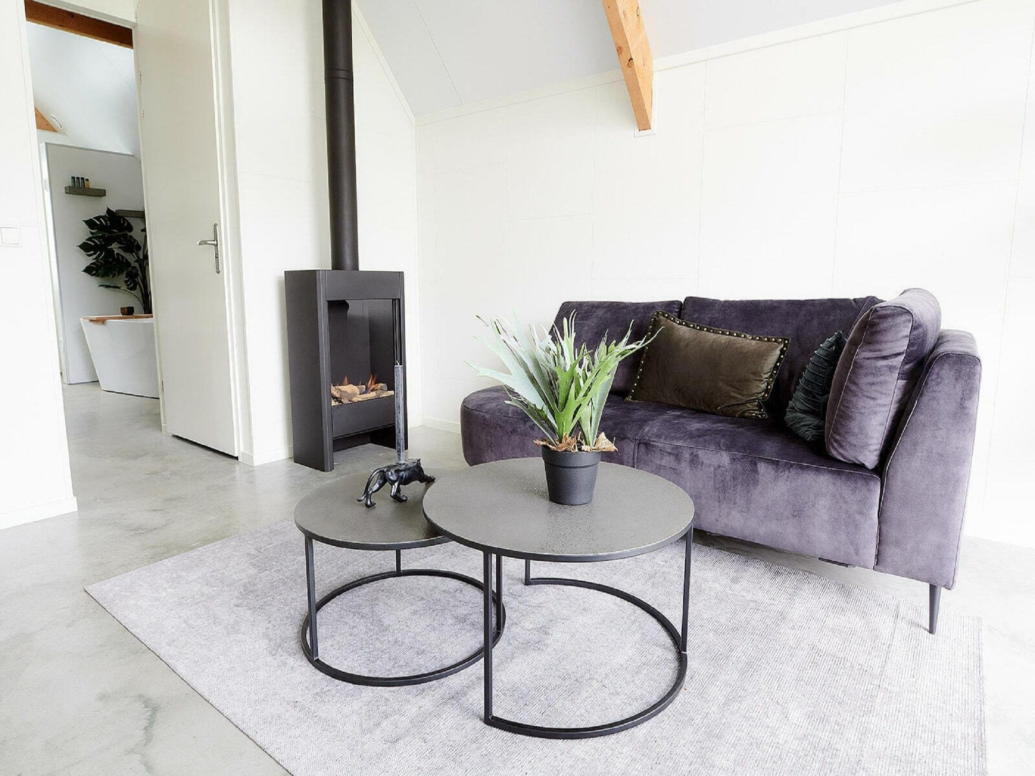 De woonkamer van Landgoed De IJsvogel 11 in Voorthuizen