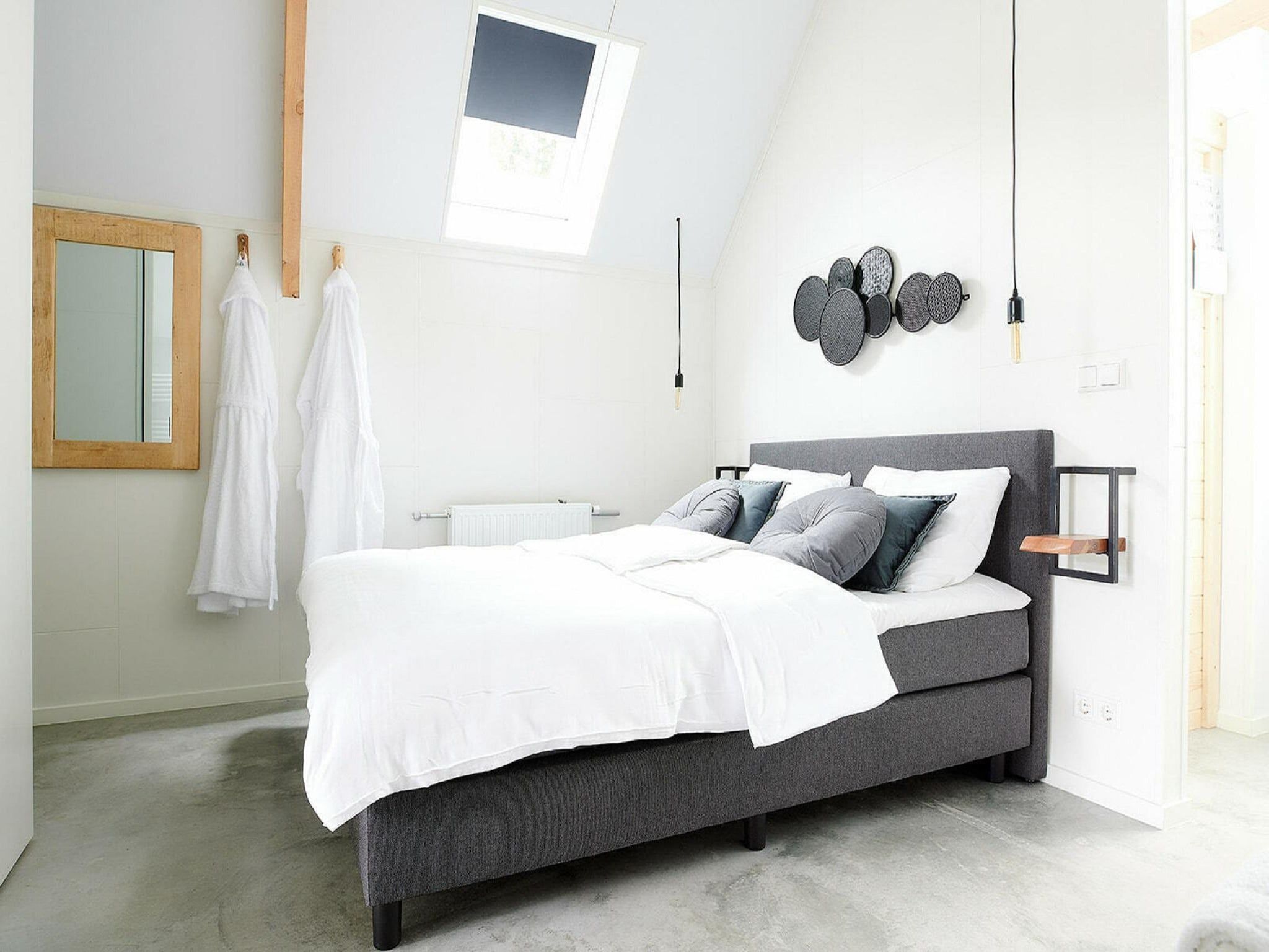 Een slaapkamer van Landgoed De IJsvogel 11 in Voorthuizen