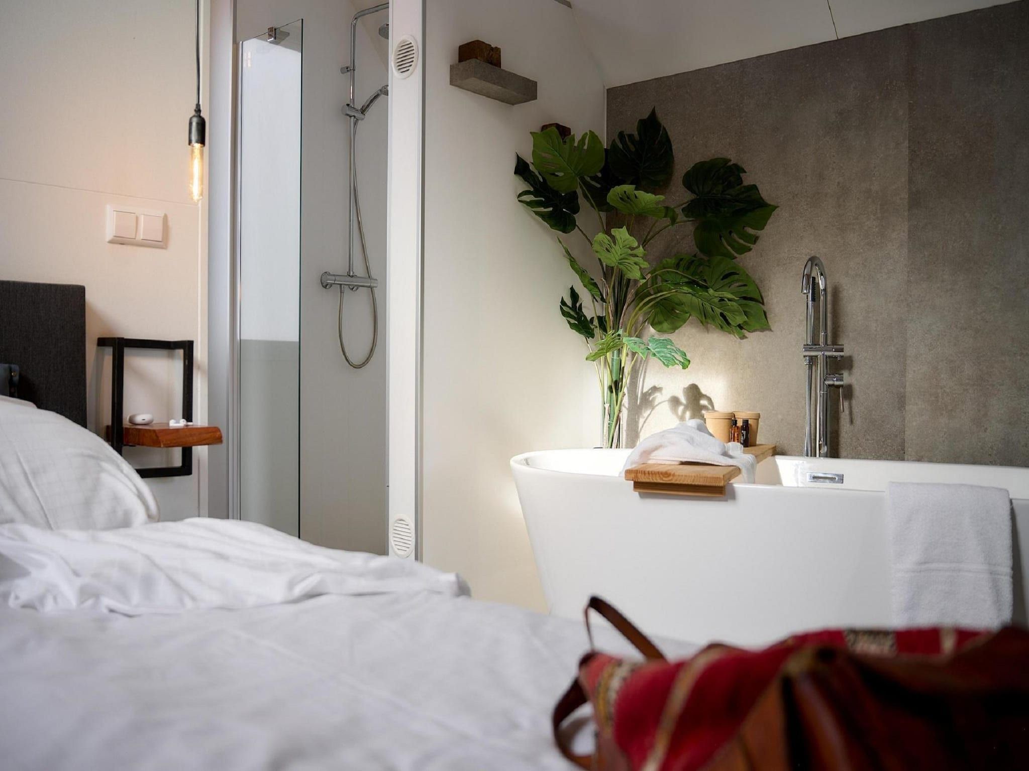 Een slaapkamer van Landgoed De IJsvogel 11 in Voorthuizen