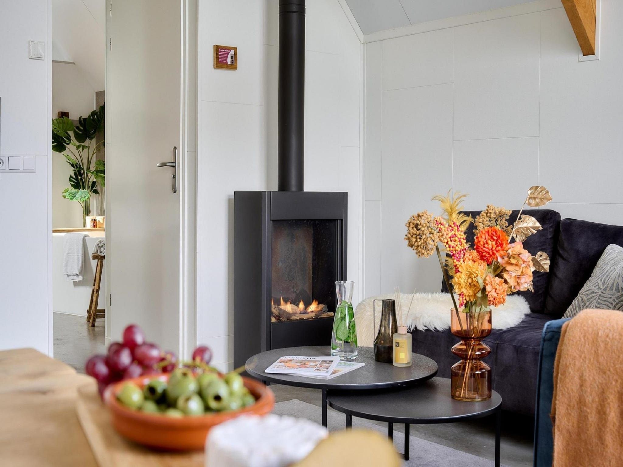 De woonkamer van Landgoed De IJsvogel 11 in Voorthuizen