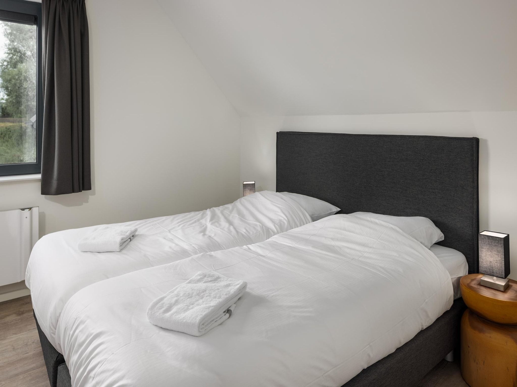 Een slaapkamer van Park Veerse Kreek 3 in Wolphaartsdijk