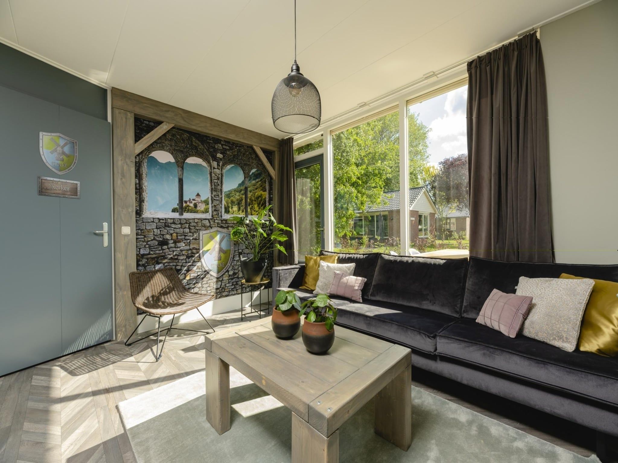 De woonkamer van Vakantiepark Mölke 18 in Zuna