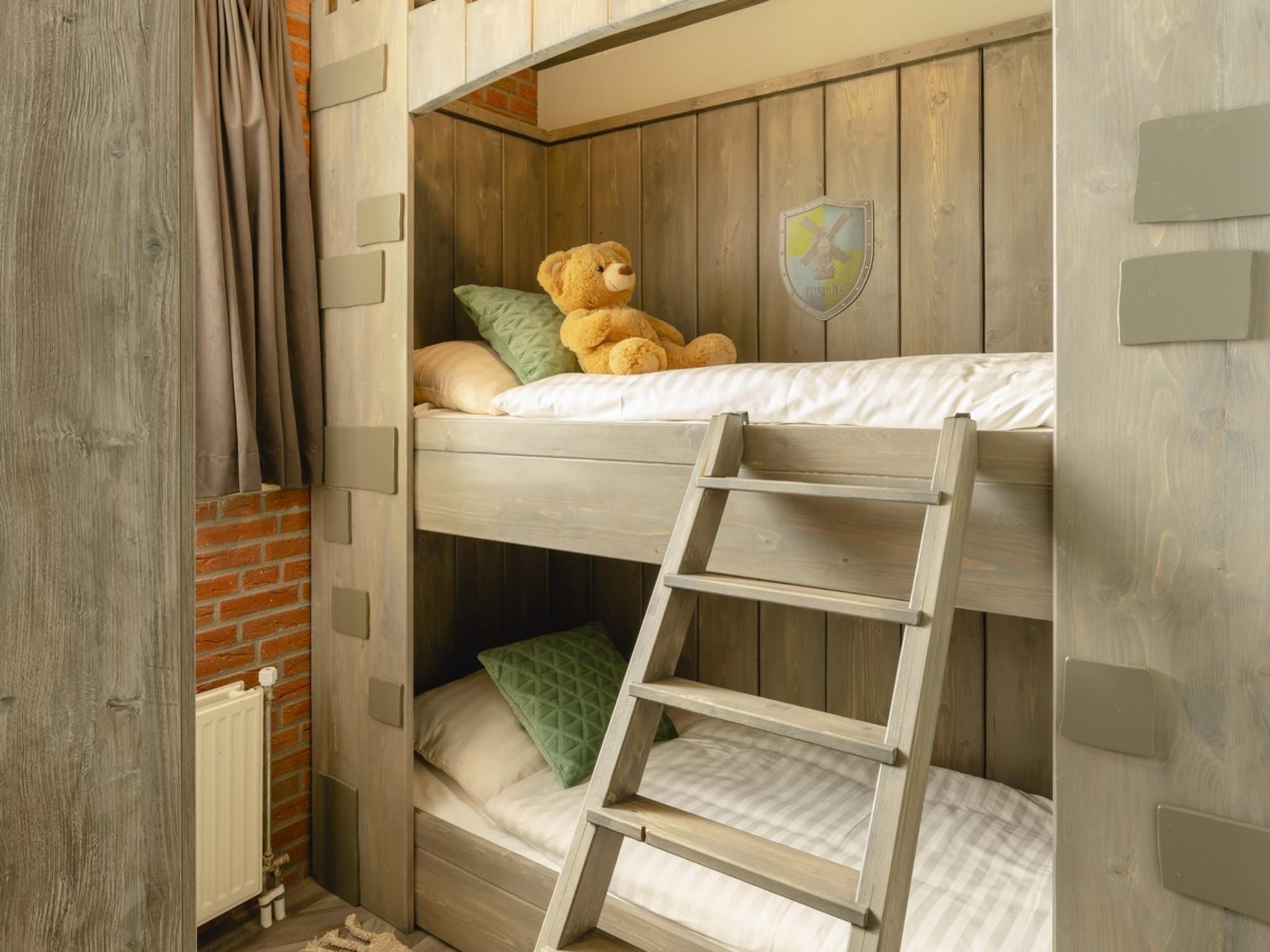 Een slaapkamer van Vakantiepark Mölke 18 in Zuna