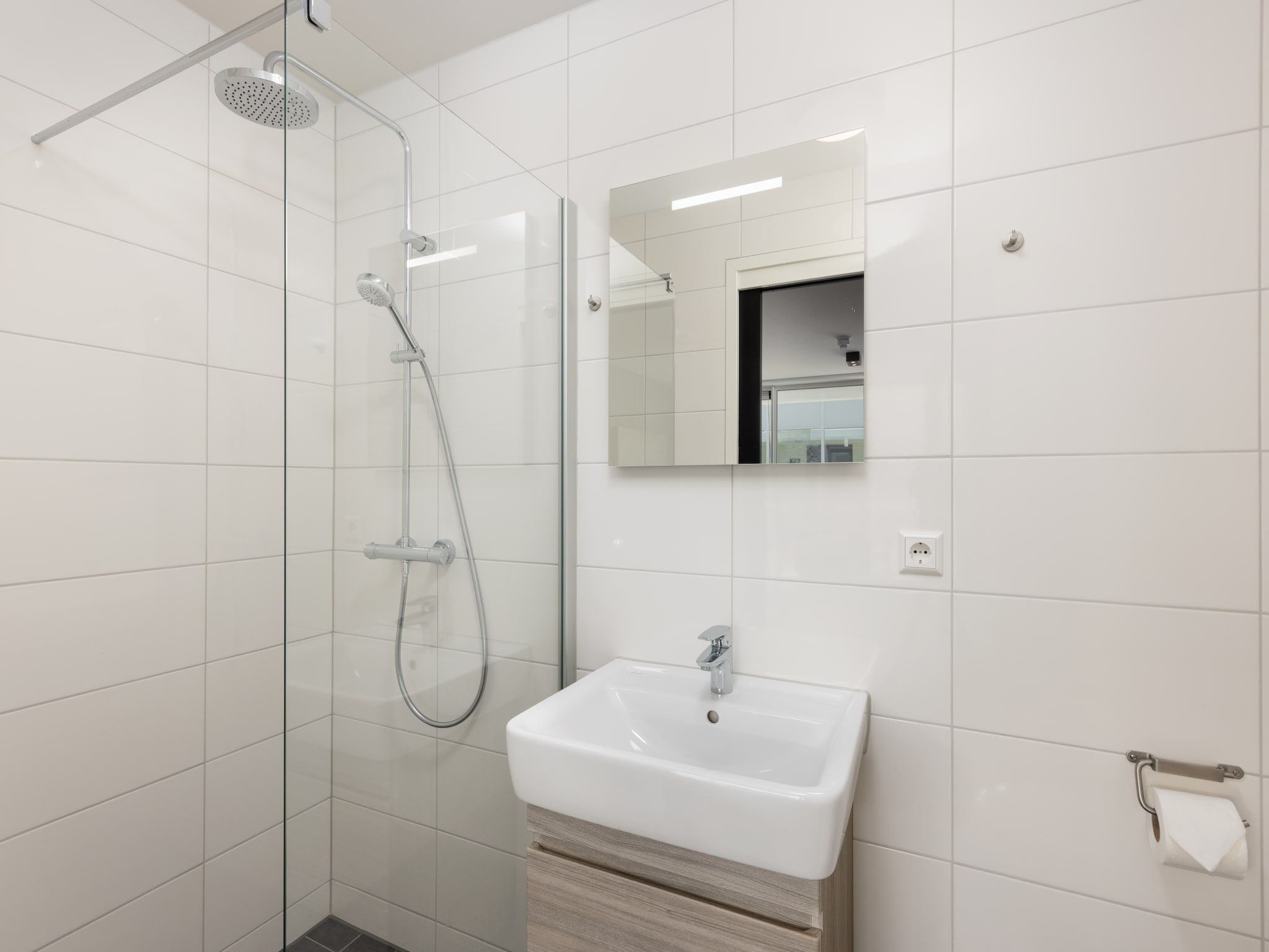 De badkamer van Residentie de Graaf van Egmont 12 in Egmond aan zee