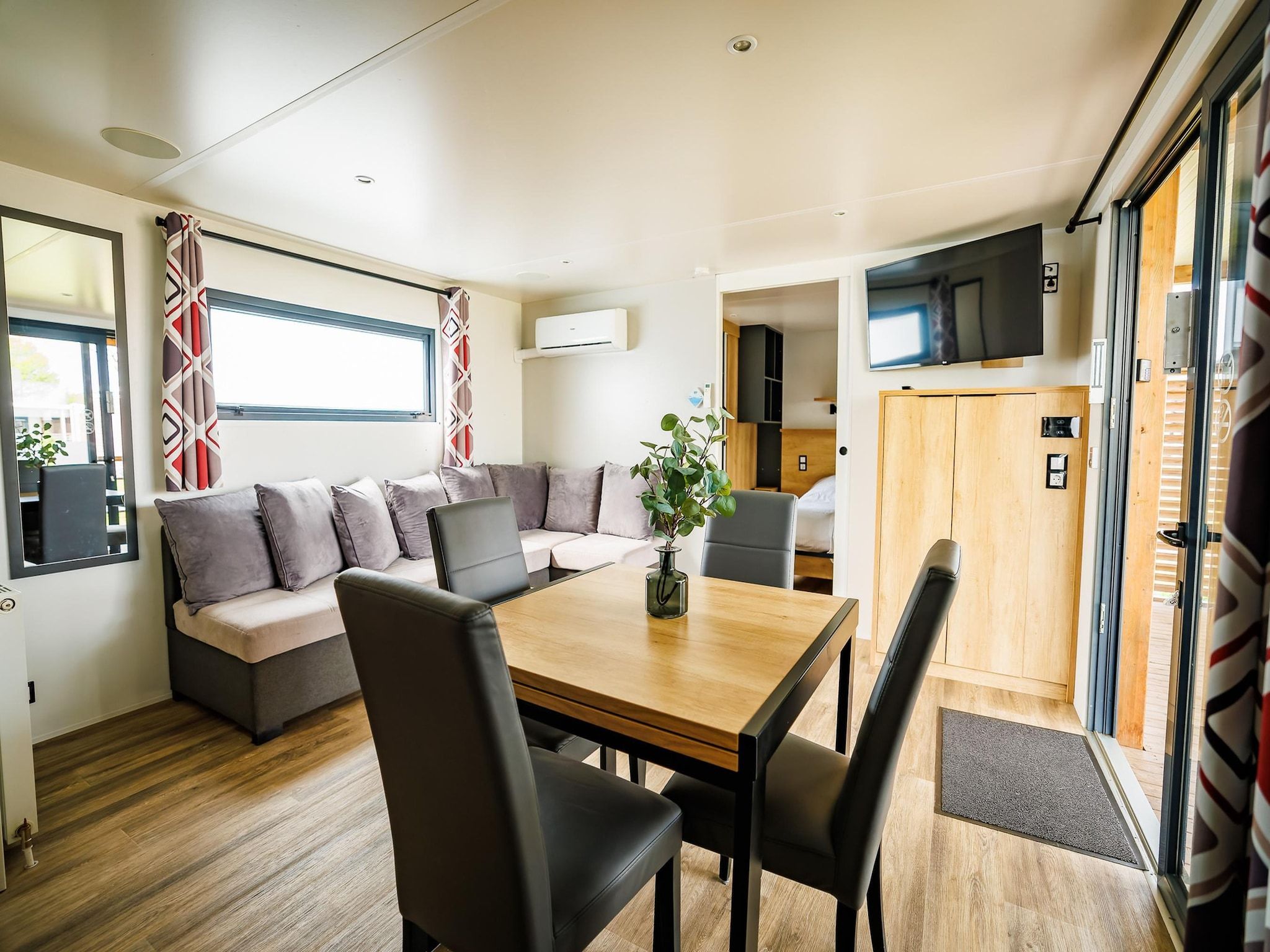 De woonkamer van Vakantiepark Eiland van Maurik 7 in Maurik