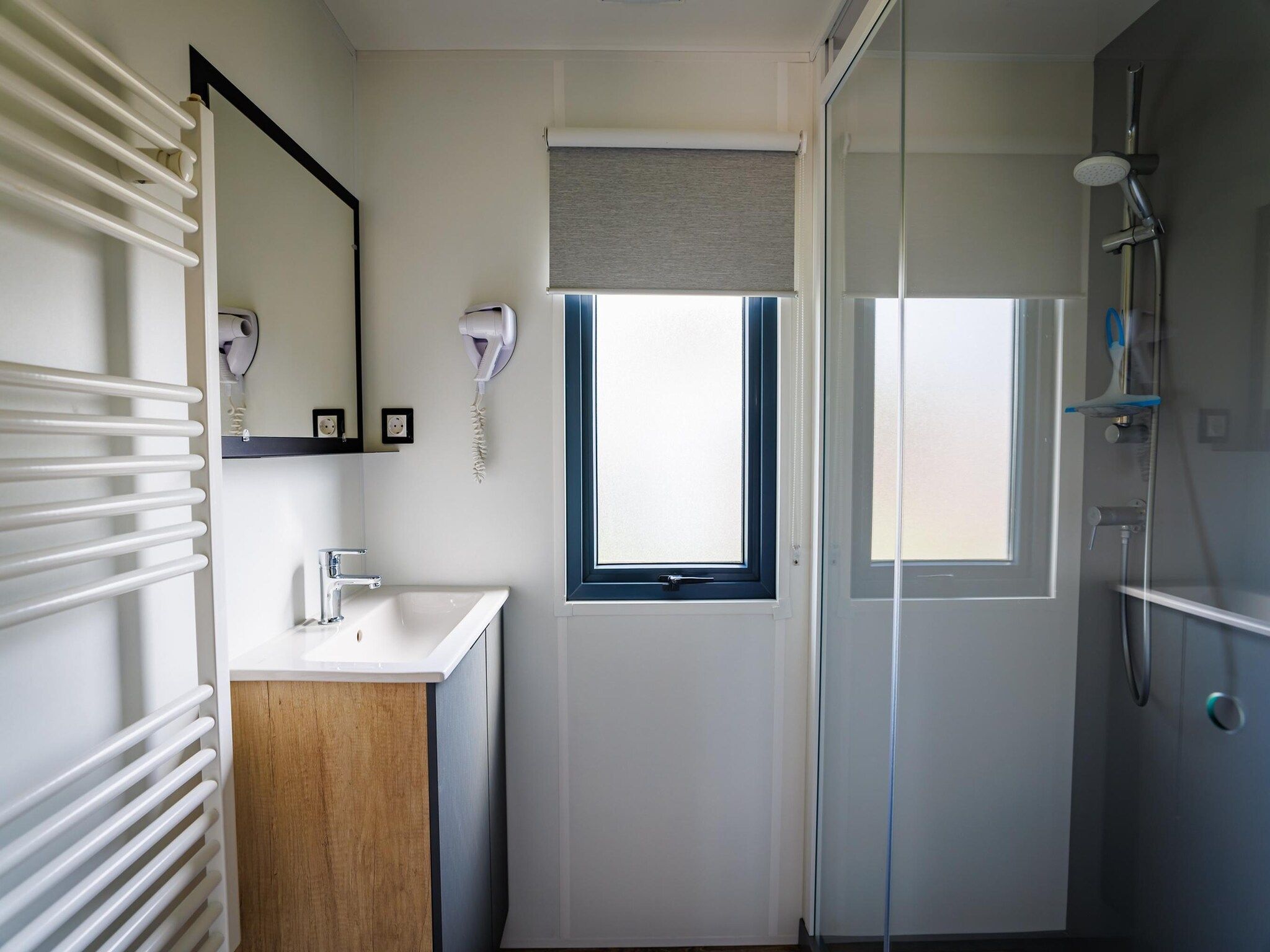 De badkamer van Vakantiepark Eiland van Maurik 8 in Maurik