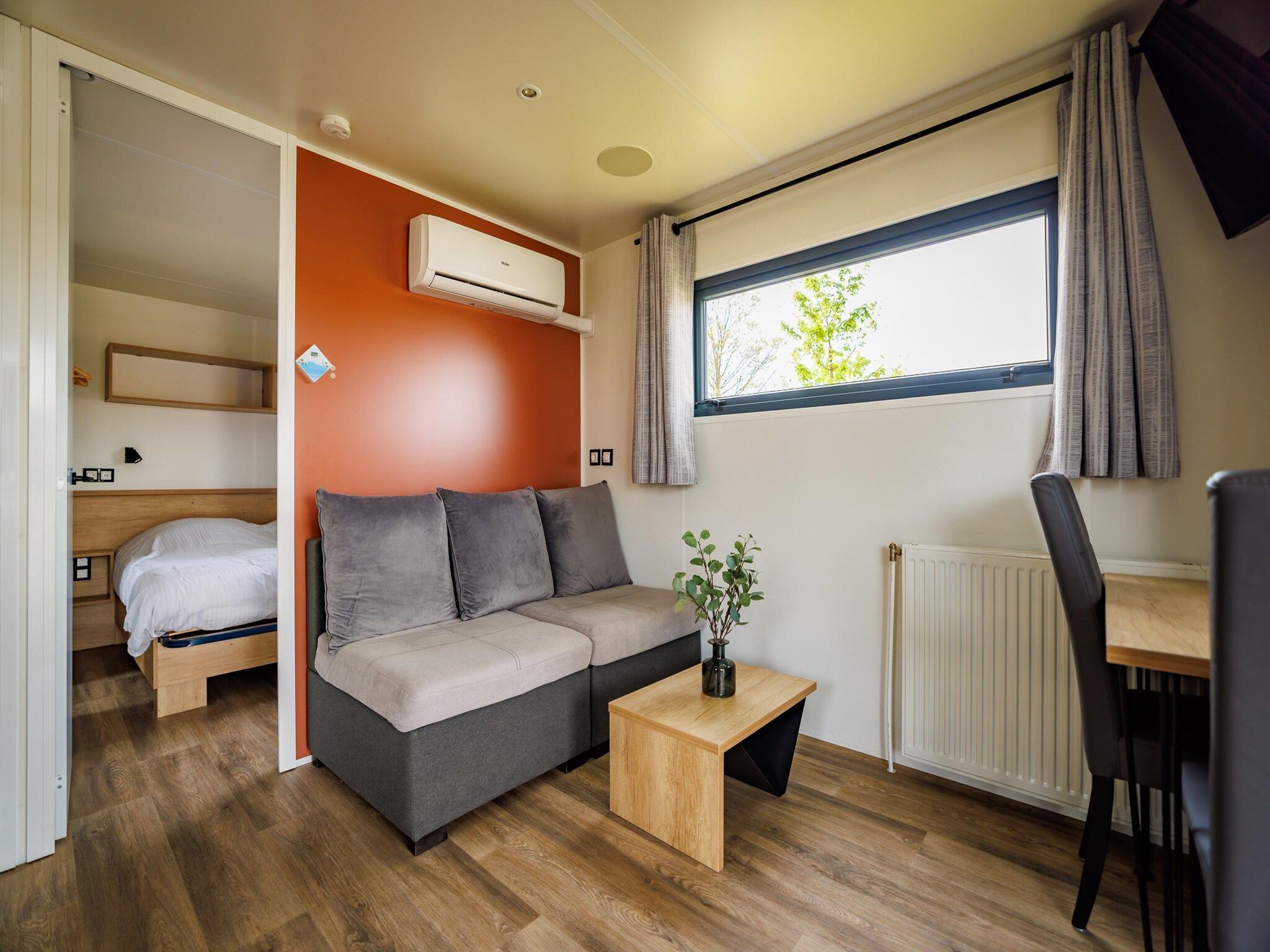 De woonkamer van Vakantiepark Eiland van Maurik 8 in Maurik