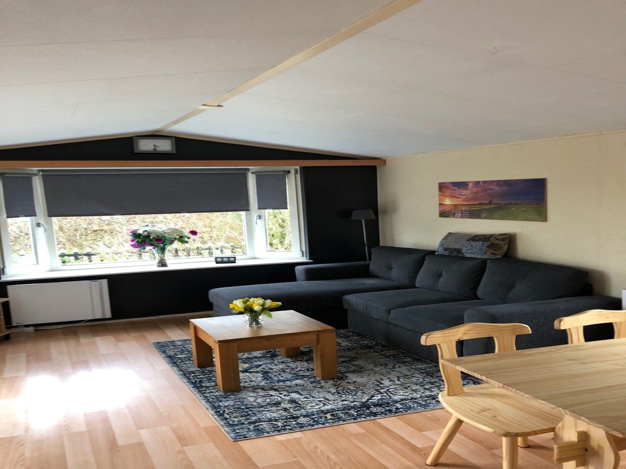 De woonkamer van Recreatiepark Wiringherlant - Wiringher Chalet 1 in Hippolytushoef