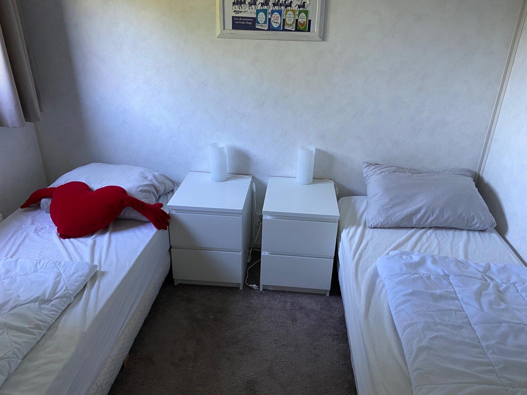 Een slaapkamer van Recreatiepark Wiringherlant - Wiringher Chalet 94 in Hippolytushoef