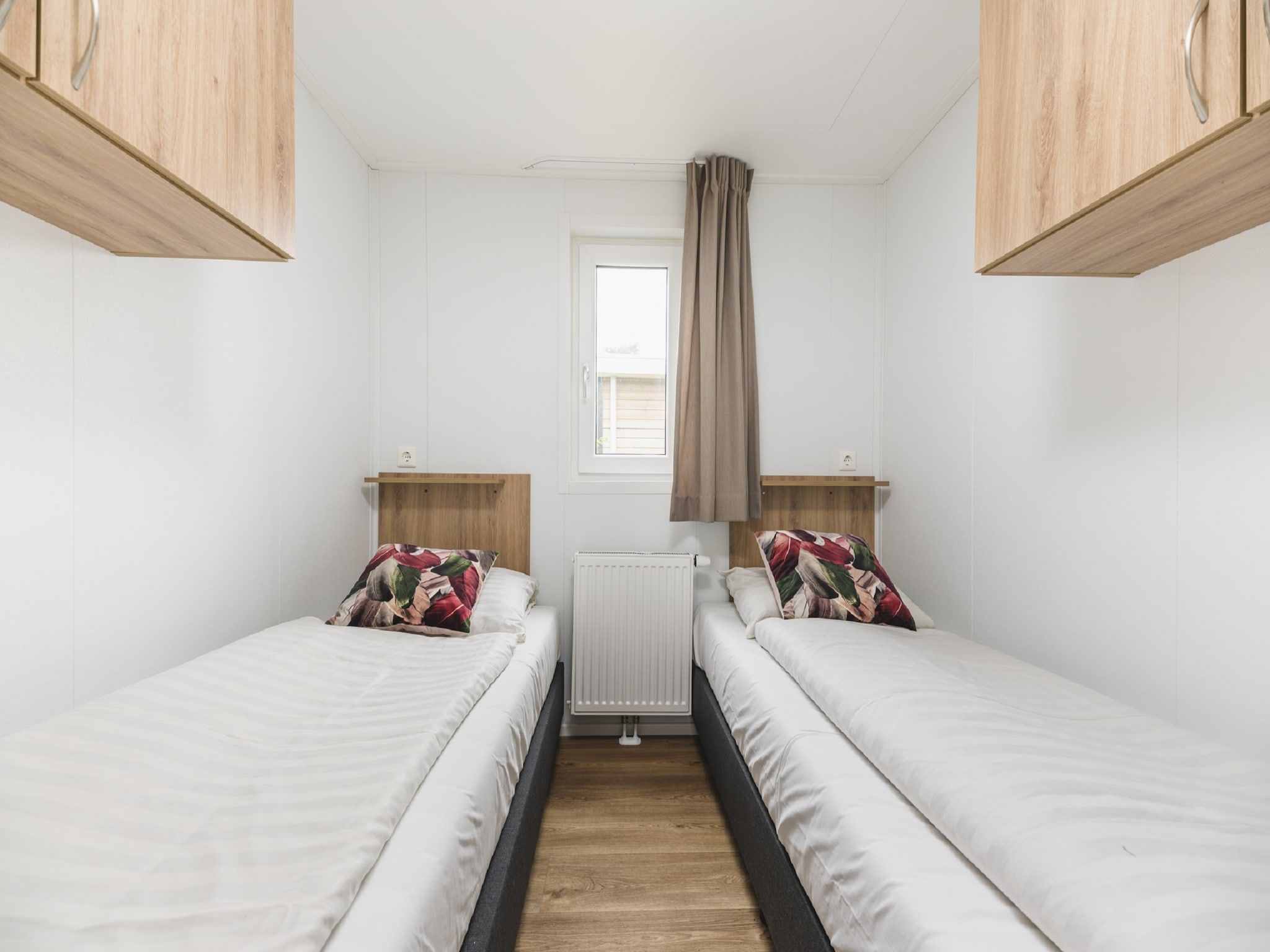Een slaapkamer van Vakantiepark Mölke 30 in Zuna