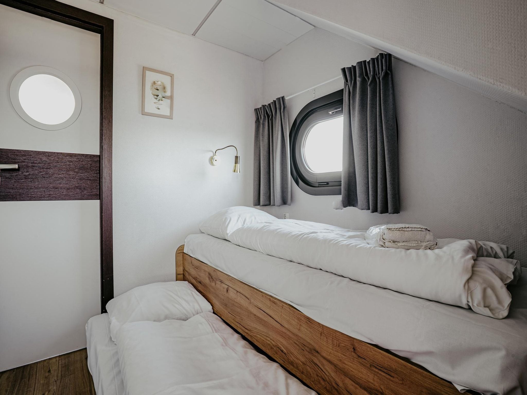 Een slaapkamer van Waterpark de Meerparel 10 in Uitgeest