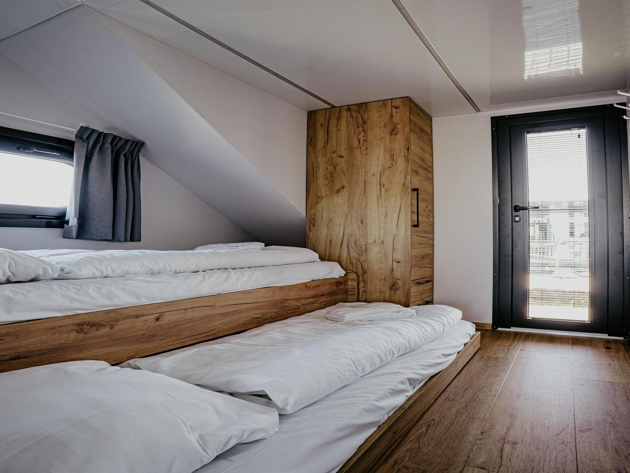 Een slaapkamer van Waterpark de Meerparel 10 in Uitgeest