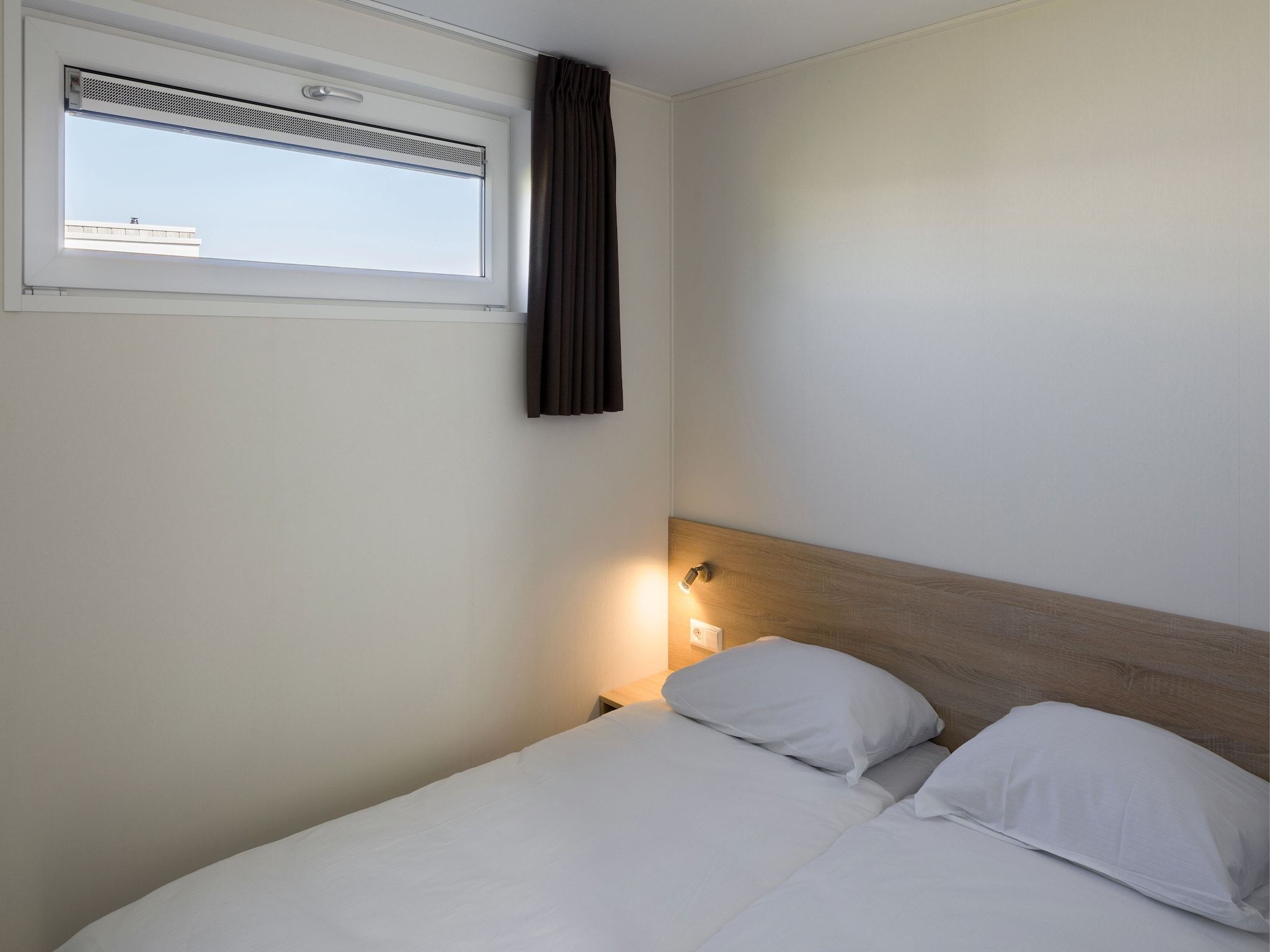 Een slaapkamer van Beach Resort Nieuwvliet-Bad 14 in Nieuwvliet-Bad